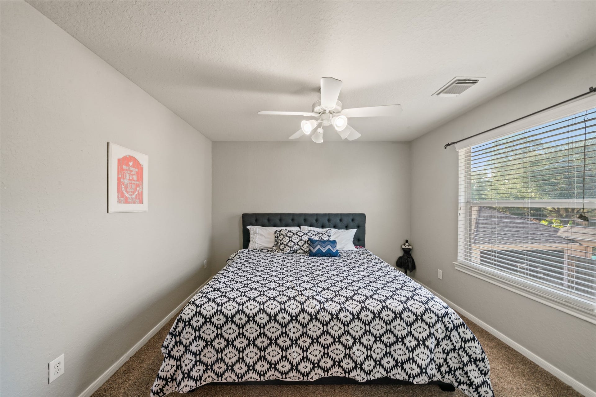 A fifth bedroom that overlooks the outdoors.