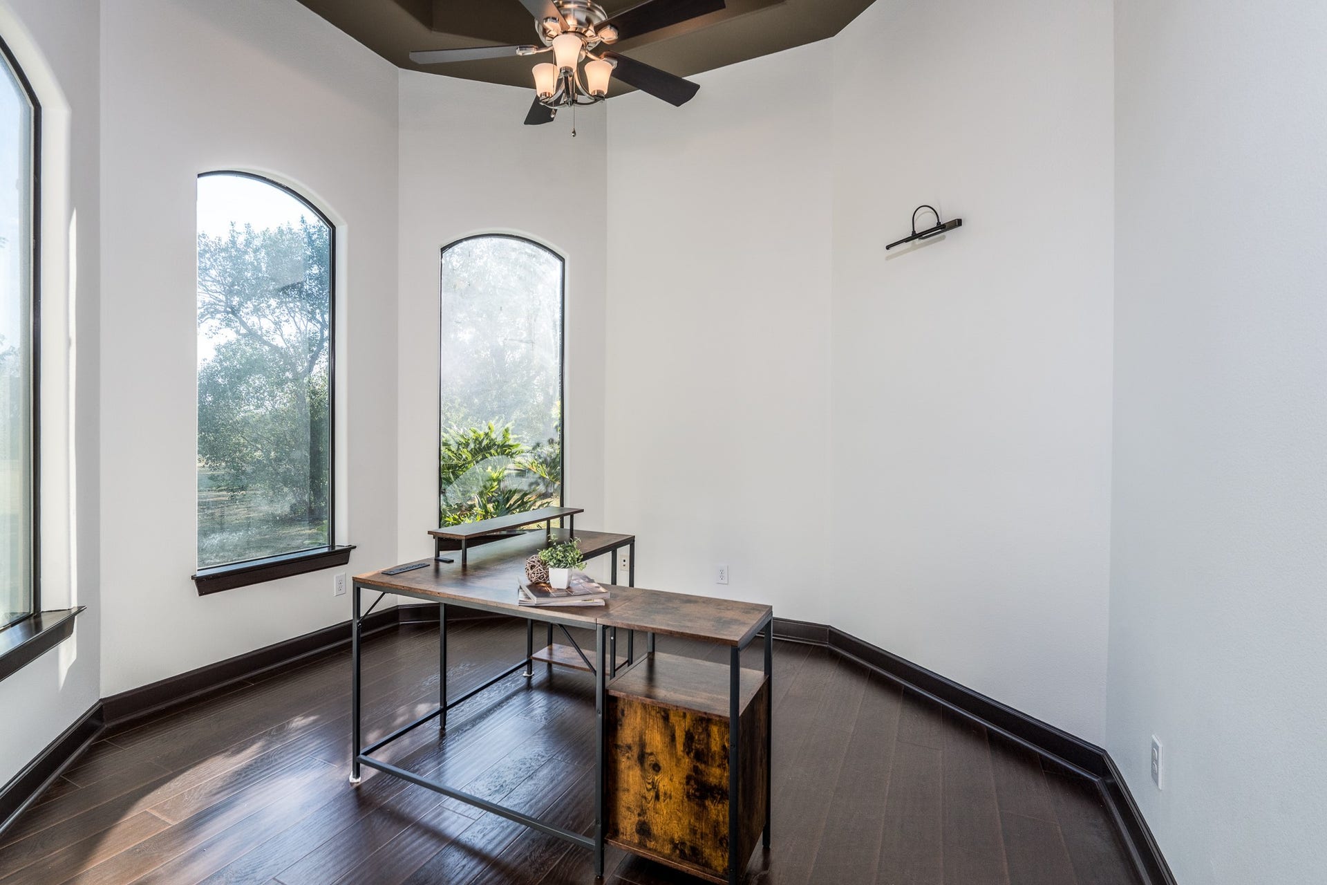 French doors lead to your private study featuring a tray ceiling.