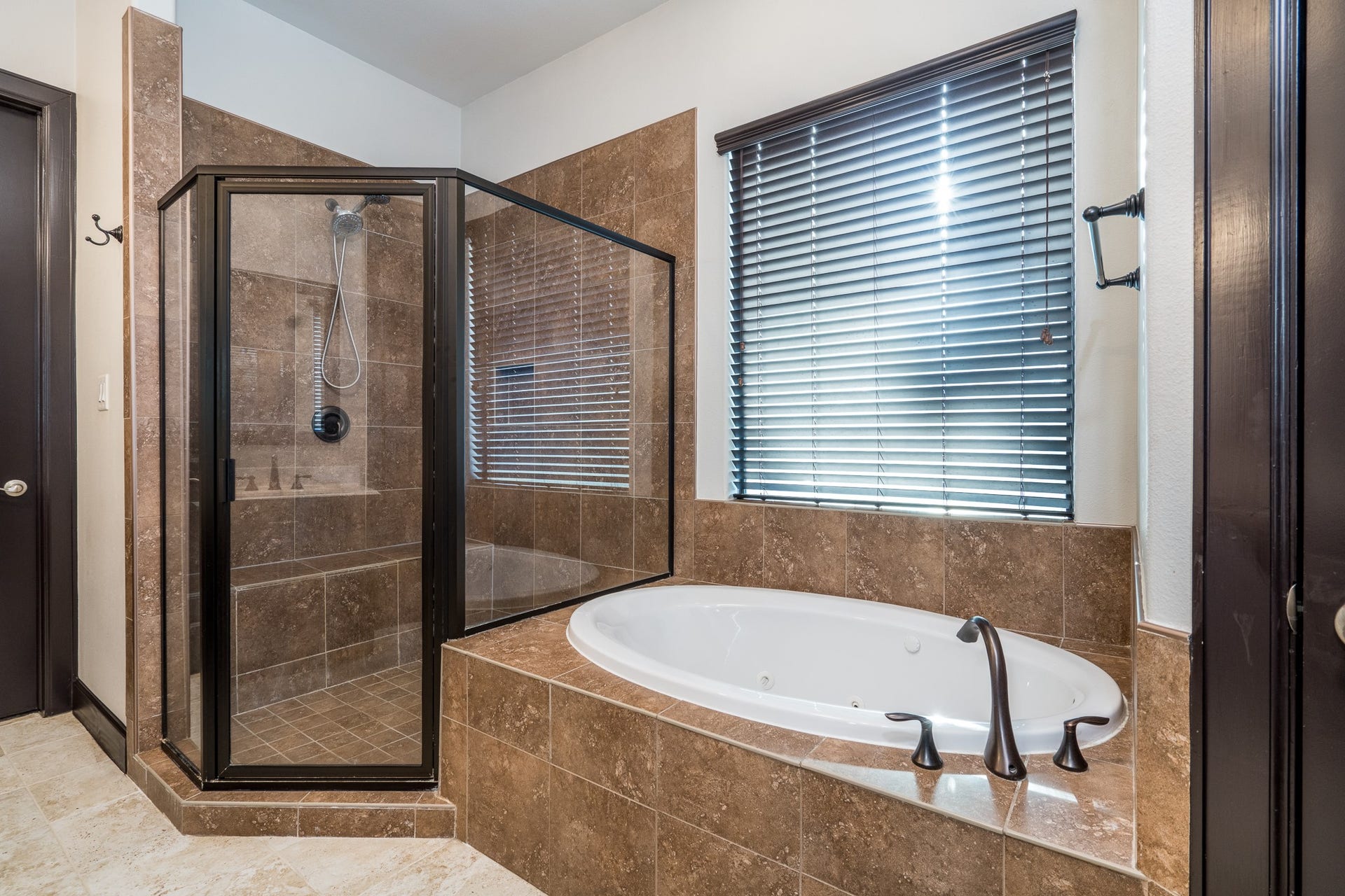 Your separate jetted tub is perfect for end-of-day relaxation.