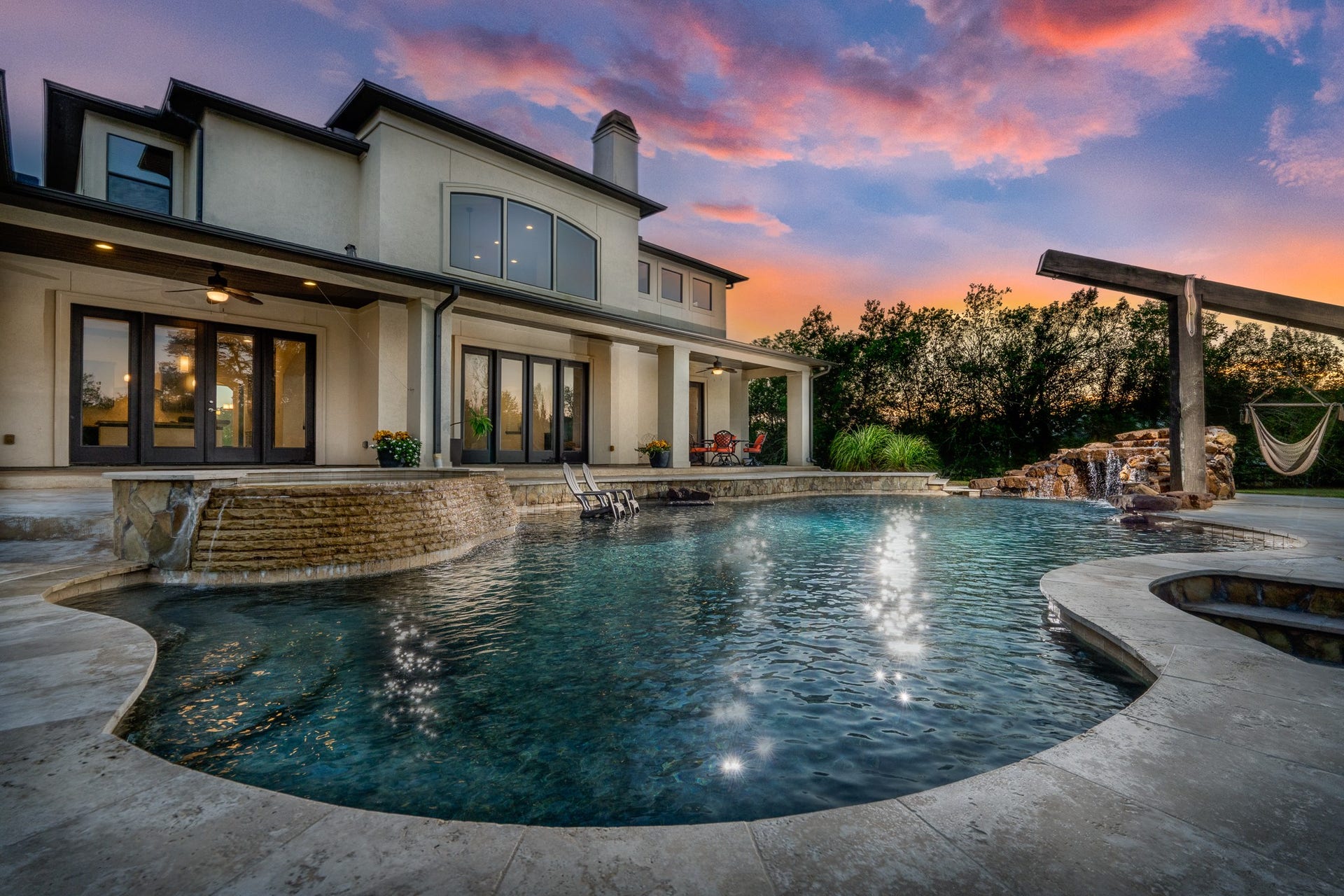 This resort-sized pool is for maximum outdoor entertaining with all the features for fun!