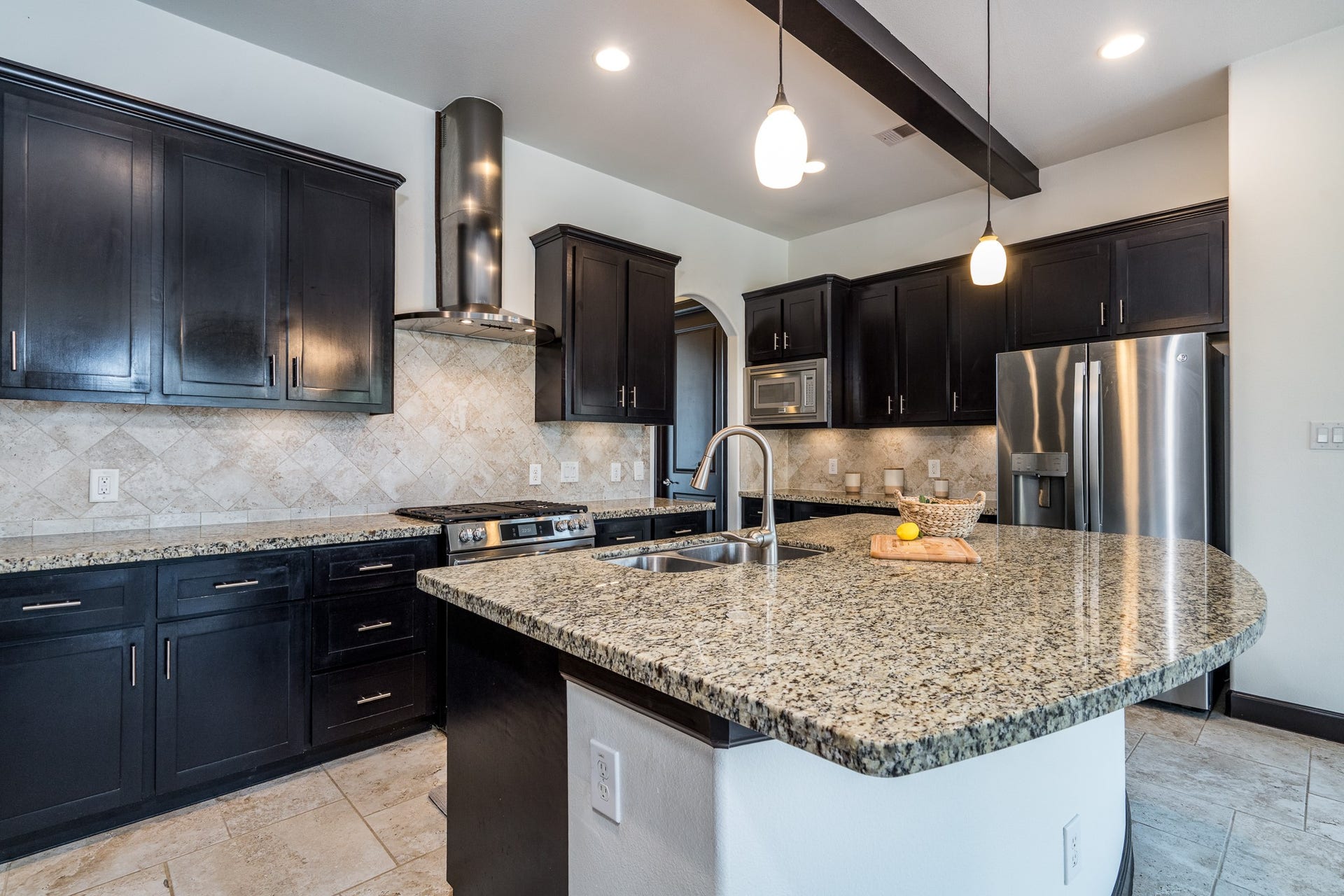Granite kitchen includes all the stainless appliances - even the recent fridge!  Washer and dryer included too.