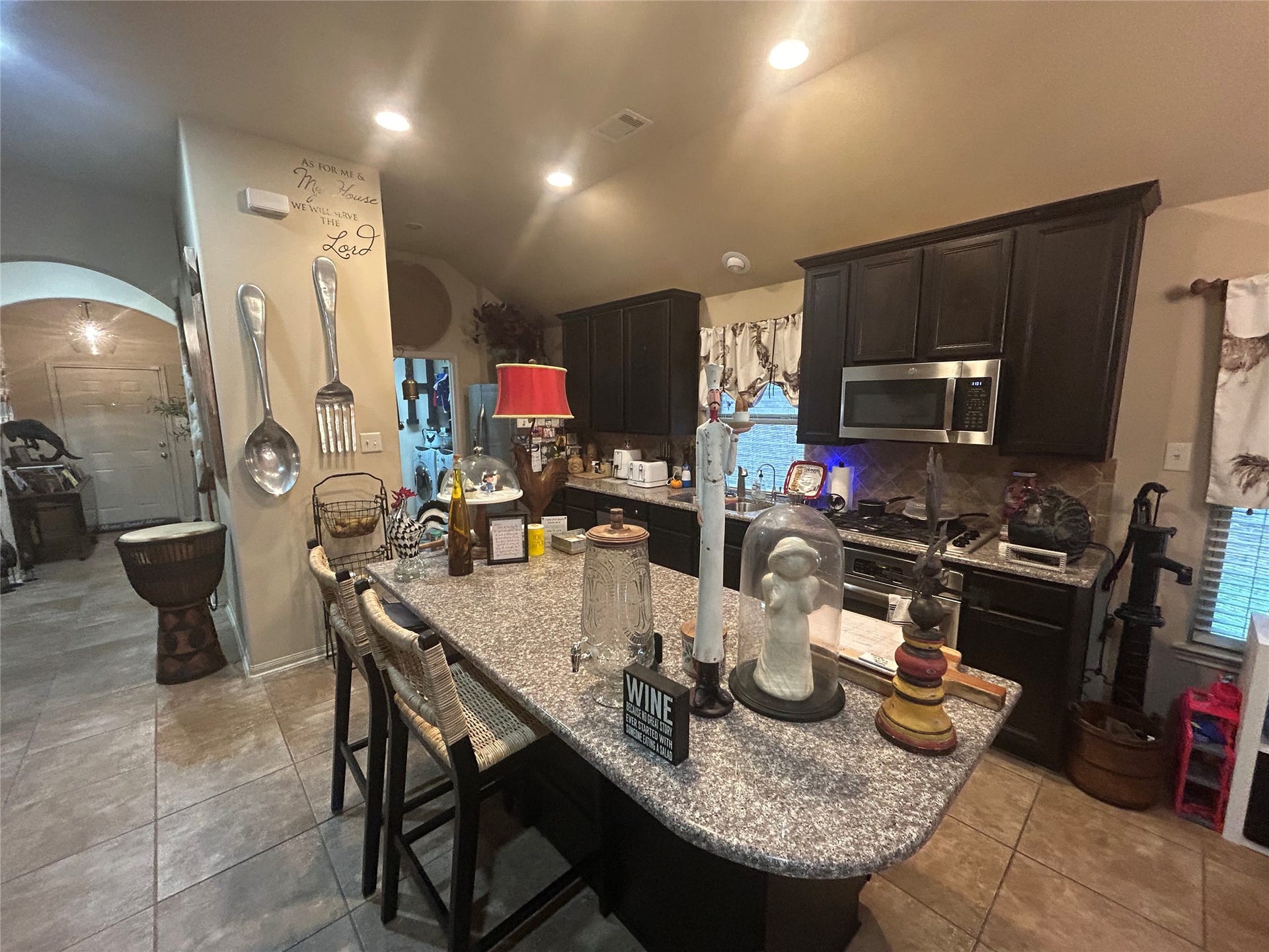 26118 Travis Brook Drive, Richmond, TX 77406 Granite countertop island with overhang for bar stools, 42inch cabinets with tile backsplash