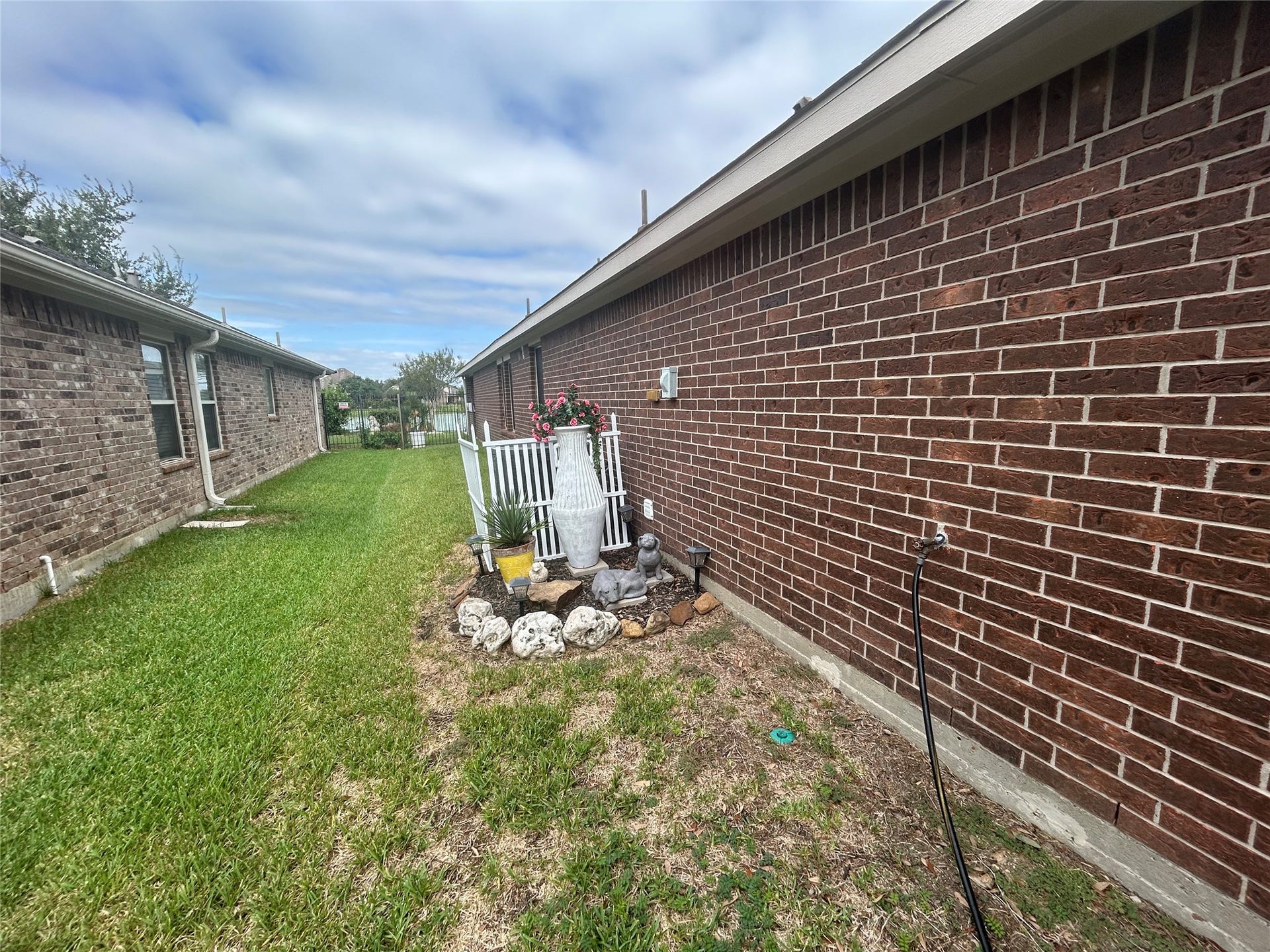 26118 Travis Brook Drive, Richmond, TX 77406 2nd Side Brick