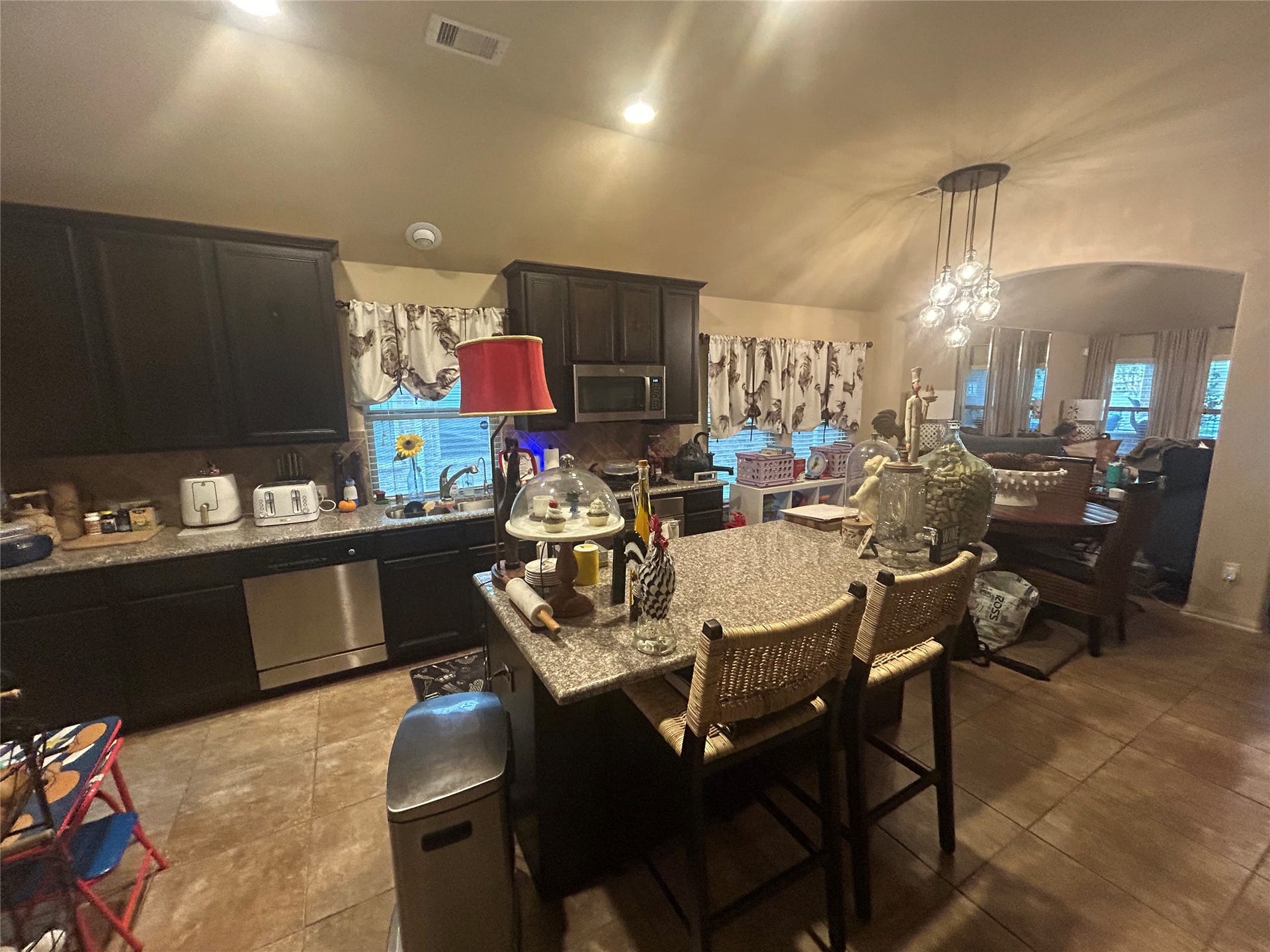 26118 Travis Brook Drive, Richmond, TX 77406 Open-Kitchen concept with kitchen table and living room a few steps away