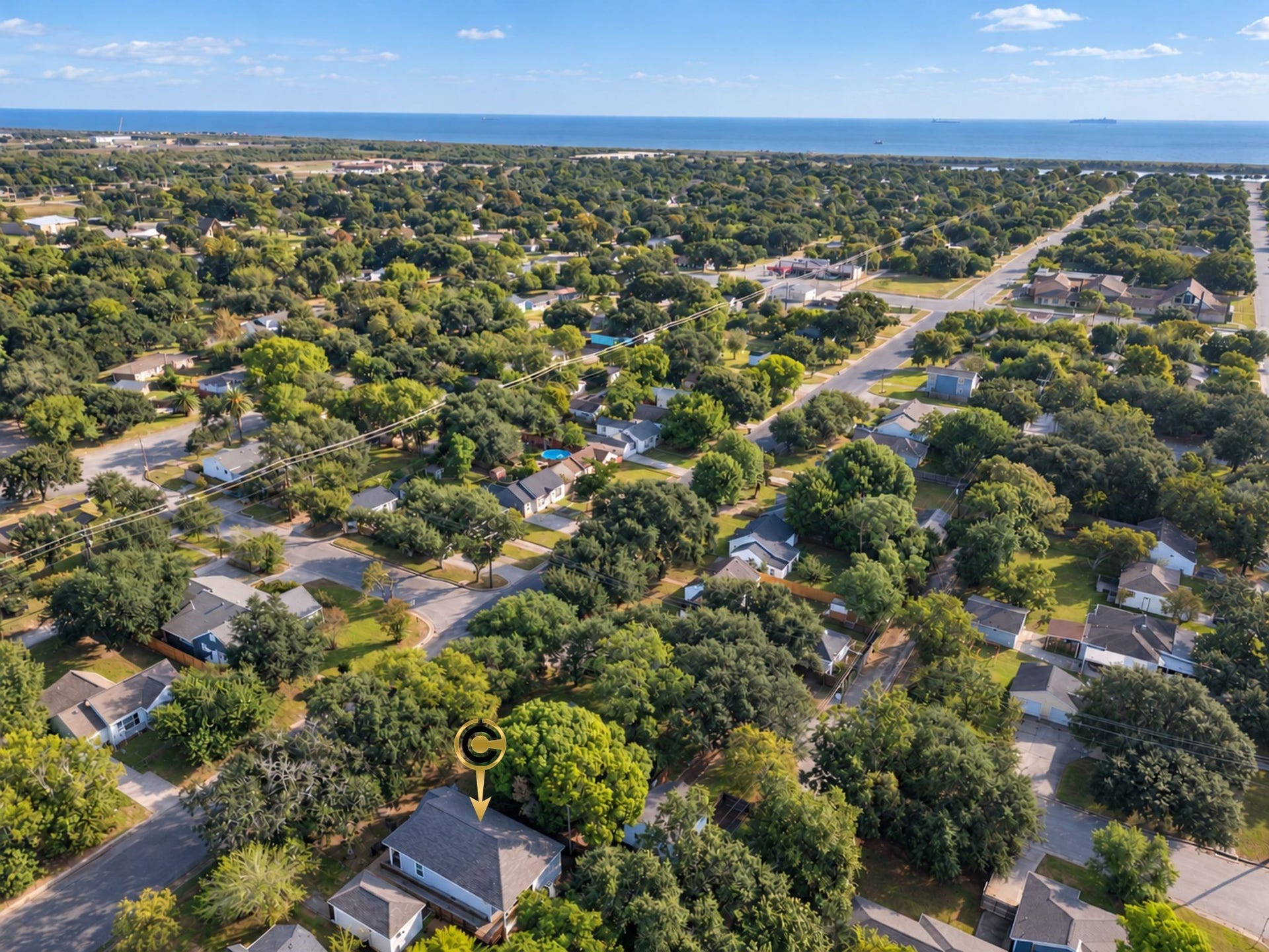 801 18th Avenue N, Texas City, TX 77590 Experience the surrounding Galveston neighborhood from above! The mature tree canopy and established residential setting add to the property's appeal for buyers looking for a home with character and a sense of place.