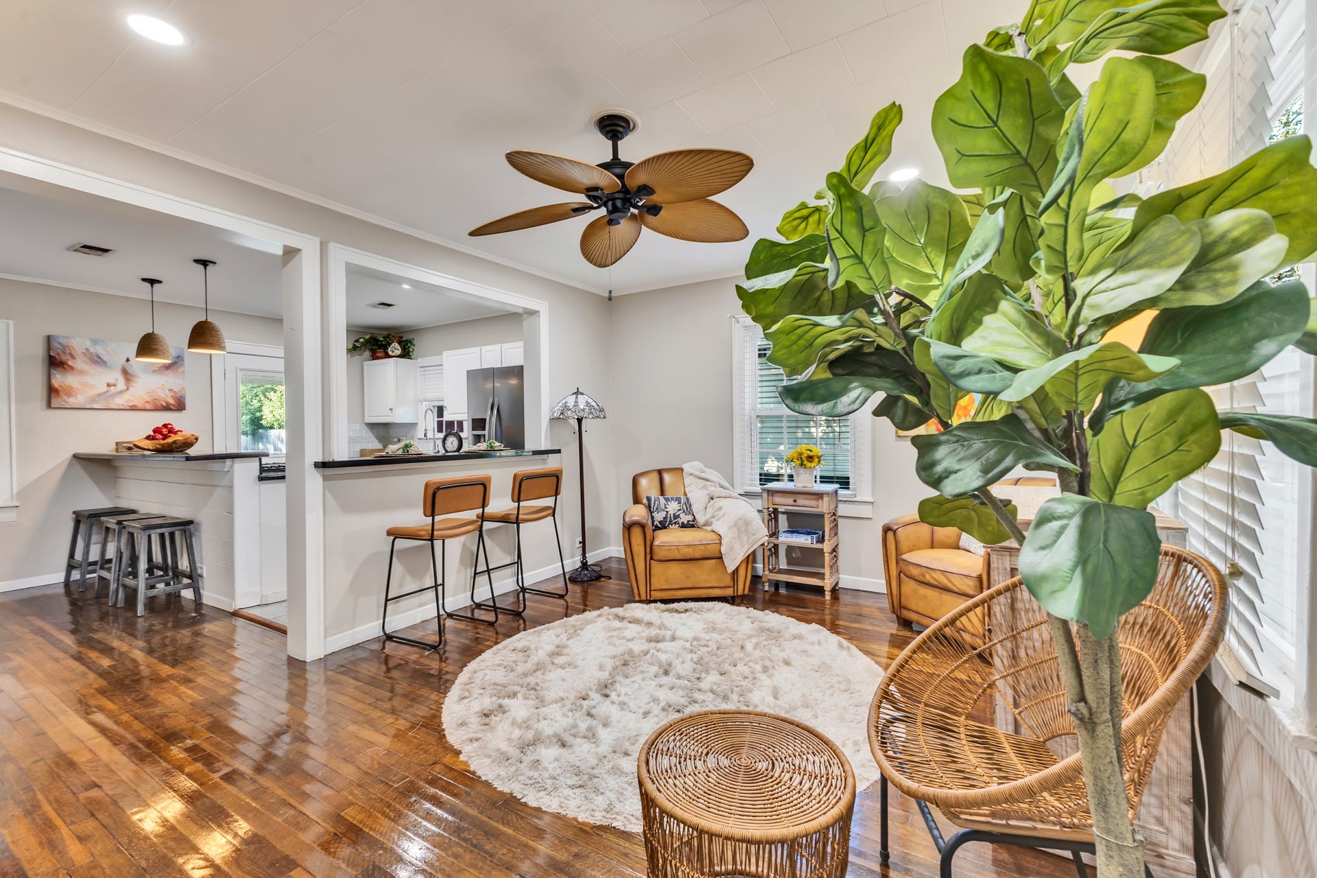 801 18th Avenue N, Texas City, TX 77590 Beautiful wood flooring adds warmth and character to this inviting living room. Its connection to the kitchen creates a practical layout that makes everyday living and entertaining feel effortless.