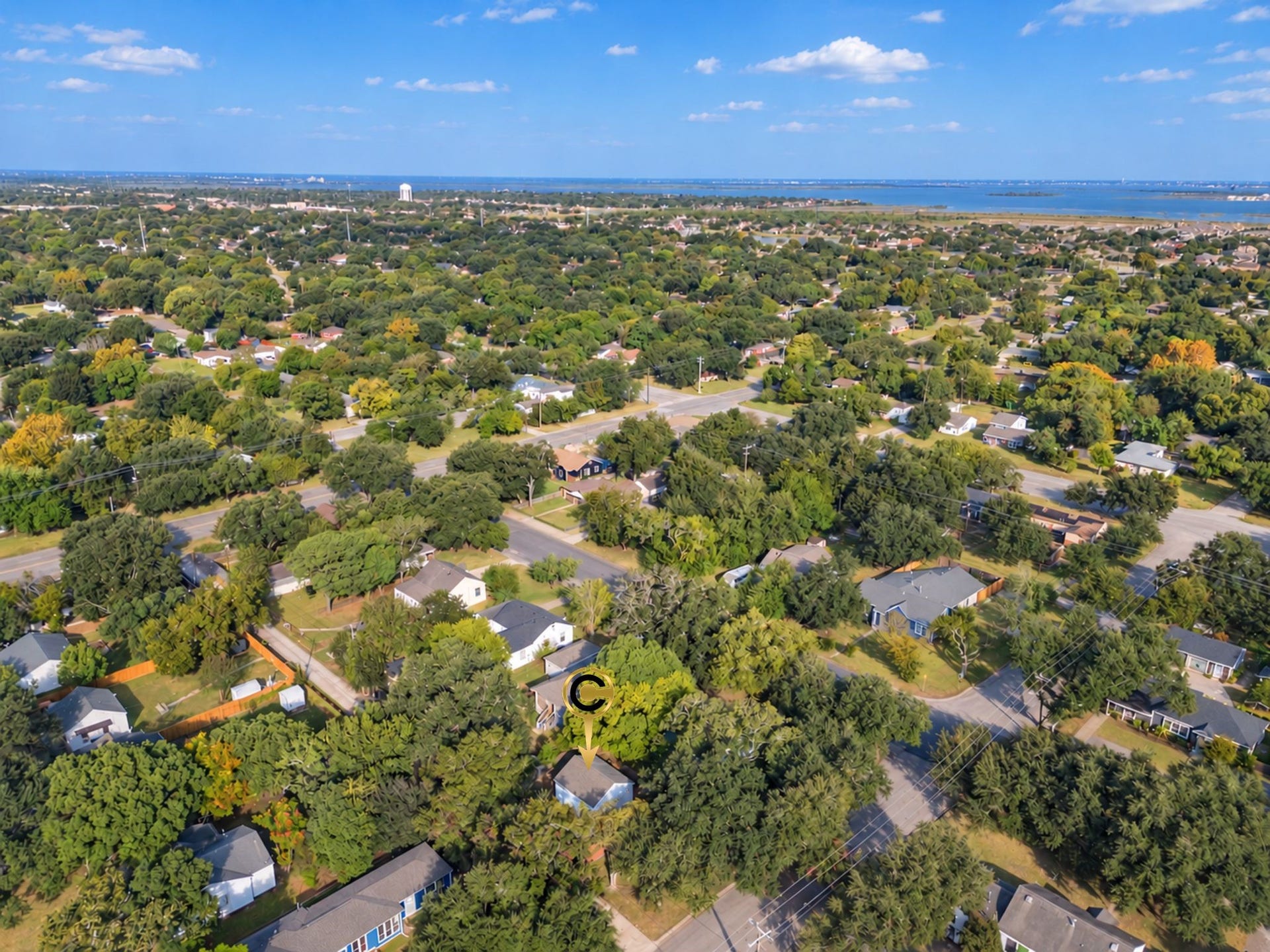 801 18th Avenue N, Texas City, TX 77590 The aerial perspective highlights the home's position among established residential streets and mature greenery. It's an opportunity to enjoy a cozy home in a neighborhood with a distinctly welcoming atmosphere.