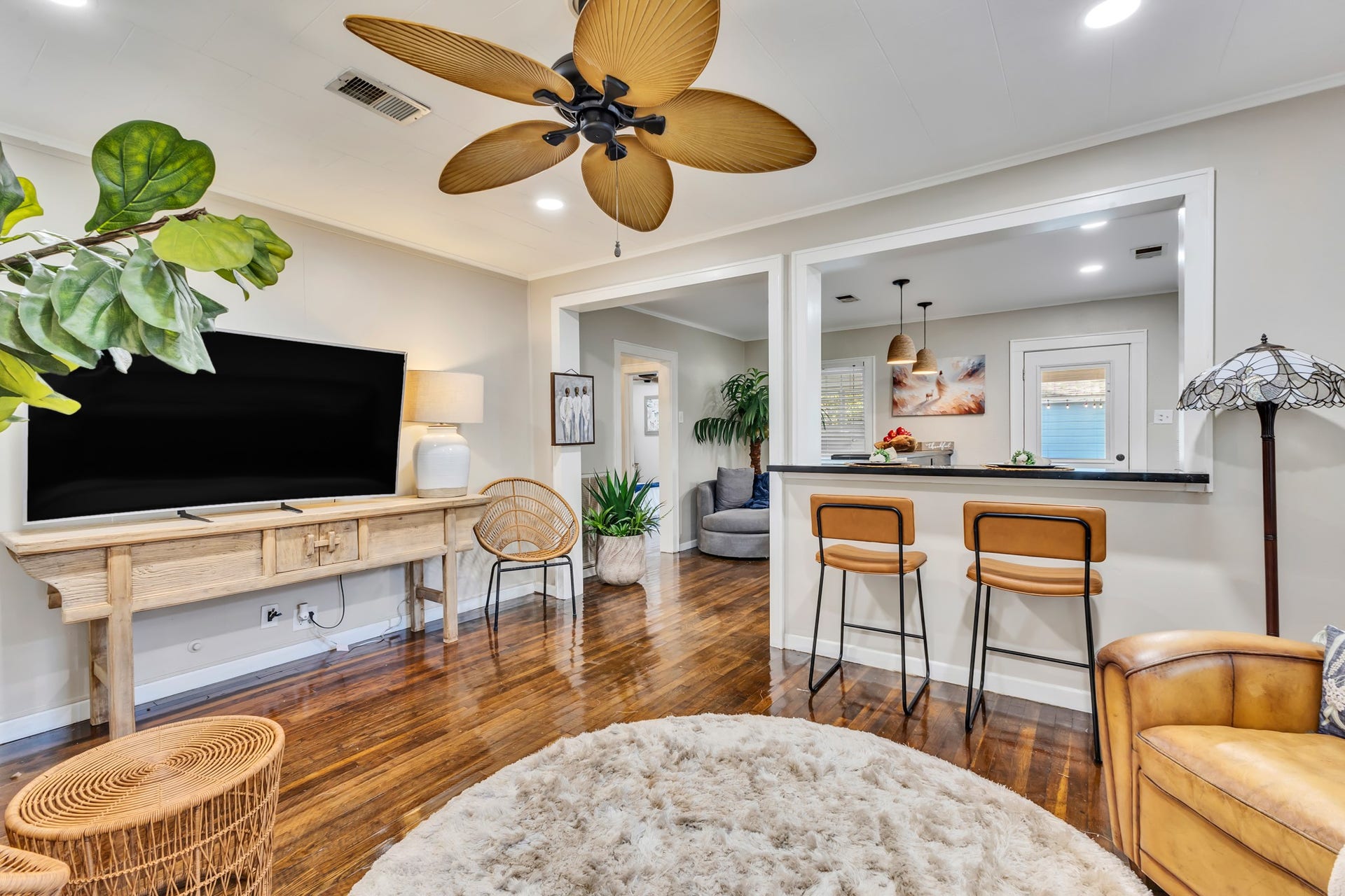 801 18th Avenue N, Texas City, TX 77590 Enjoy the convenience of a living room that connects directly to the kitchen through a breakfast bar. This functional design keeps everyone connected, whether you're preparing meals, entertaining guests, or enjoying a quiet evening at home.