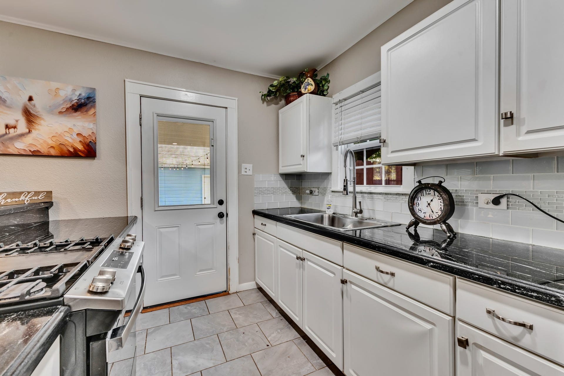 801 18th Avenue N, Texas City, TX 77590 The kitchen's crisp cabinetry and coordinated finishes offer timeless appeal. With practical storage and counter space, this room provides the functionality buyers appreciate in a home of this size.