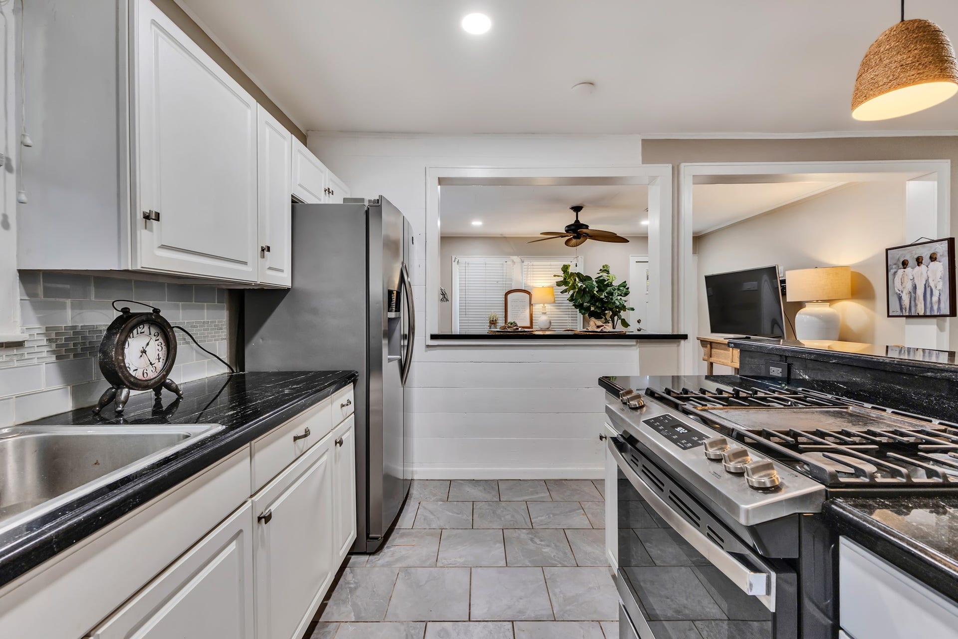 801 18th Avenue N, Texas City, TX 77590 The kitchen opens toward the living room, creating a connected layout that makes the home feel welcoming. This thoughtful use of space allows you to enjoy comfortable everyday living without unnecessary separation.
