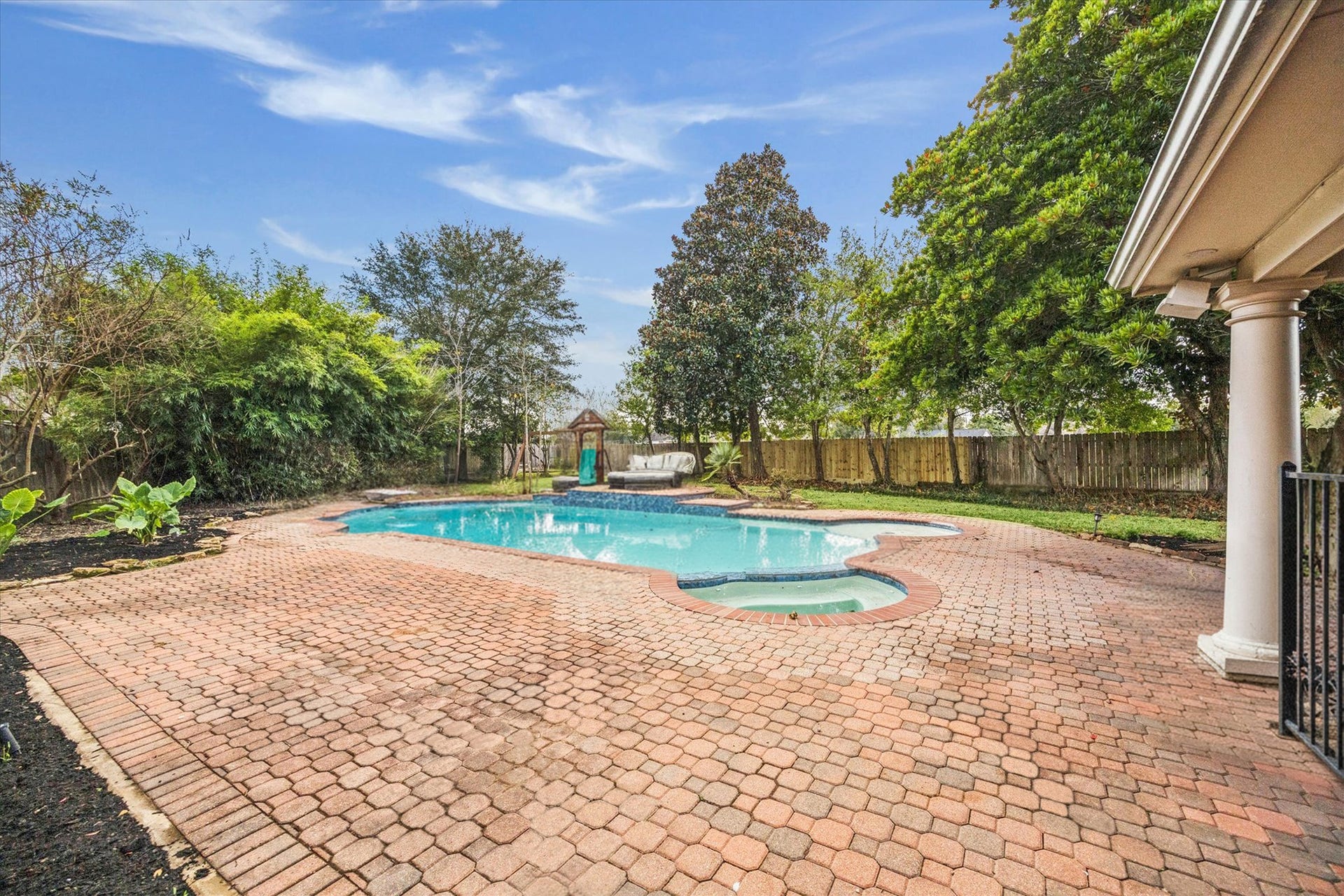 2526 STEPHENS GRANT DRIVE, Sugar Land, TX 77479 The relaxing pool is ready for enjoyment any time thanks to the added convenience of a pool with a heater, ensuring comfortable swimming well beyond the summer months.
