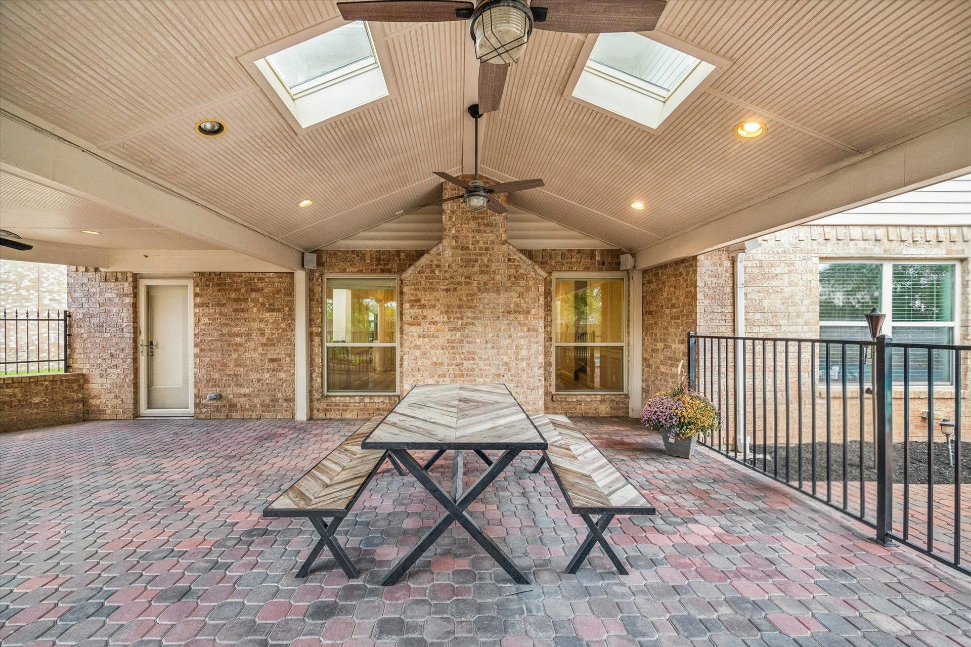 2526 STEPHENS GRANT DRIVE, Sugar Land, TX 77479 This photo shows the expansive covered patio, ideal for large backyard entertaining, featuring skylights and ceiling fans.