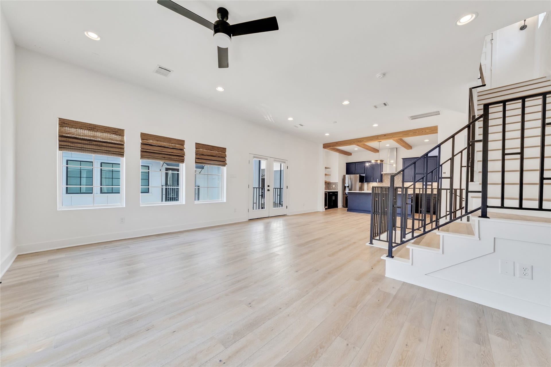 1035 W 24th Street, Houston, TX 77008 Another view of the living/dining room on the second floor with lots of windows for natural lighting.