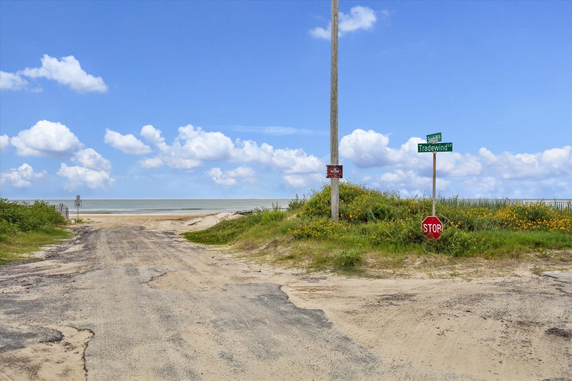 923 Tidelands Drive, Crystal Beach, TX 77650 Just a short walk to the beach access! Enjoy the convenience of driving your car or golf cart directly onto the sand for a fun-filled day in the sun with family.