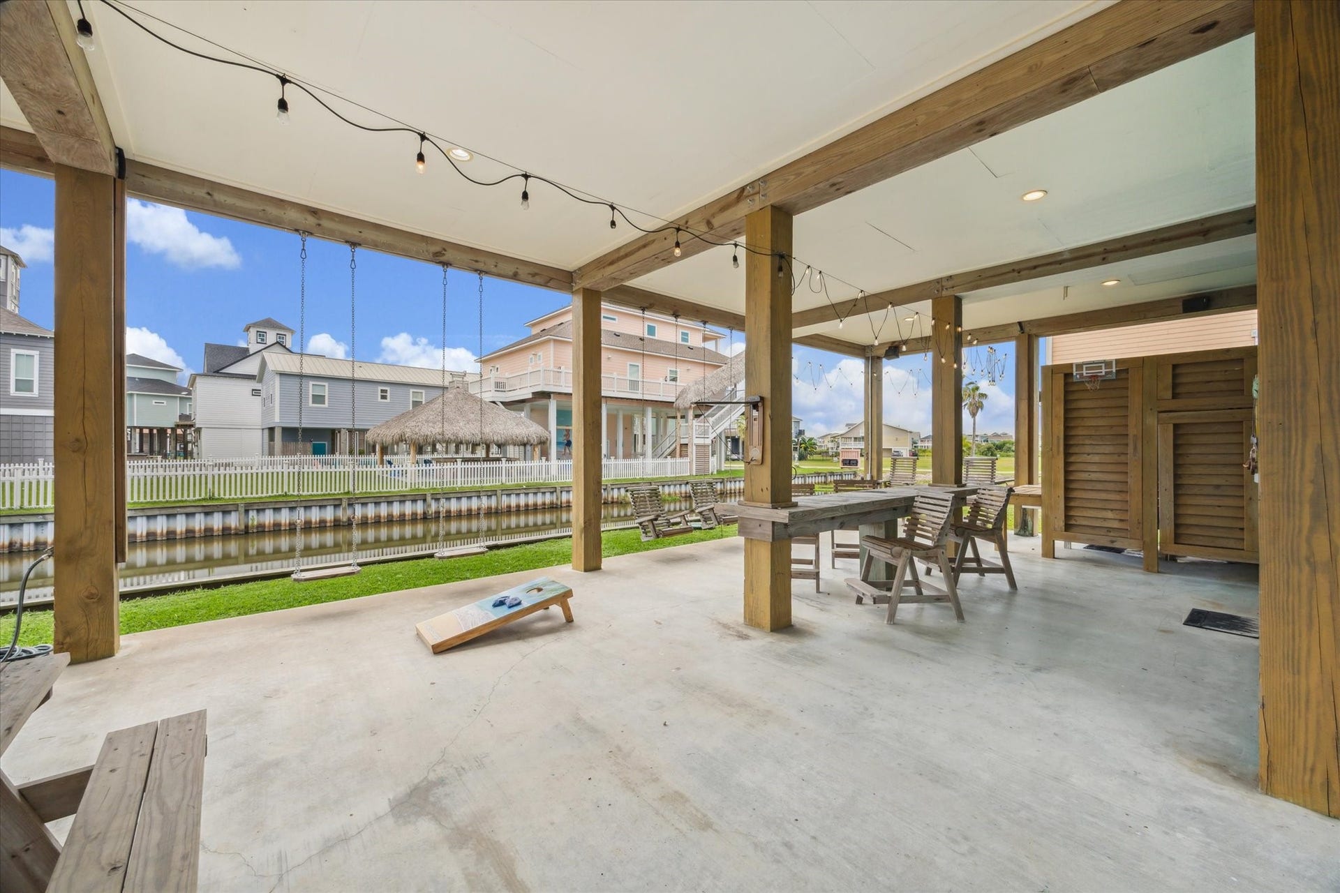 923 Tidelands Drive, Crystal Beach, TX 77650 Built-in outdoor bar top ready for family gatherings and beach memories to be made, offering the perfect spot to relax, unwind, and enjoy the coastal breeze with loved ones.