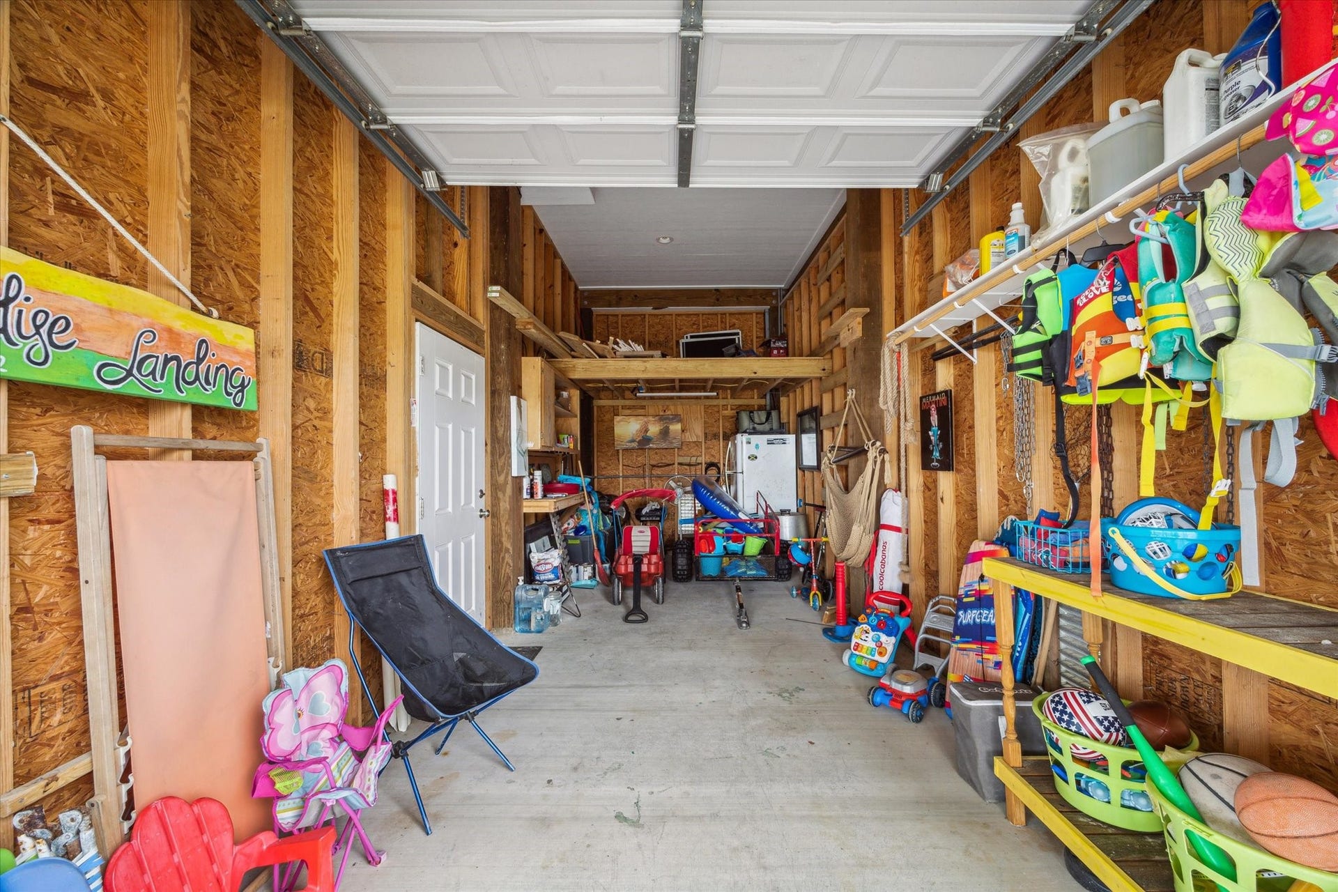 923 Tidelands Drive, Crystal Beach, TX 77650 Spacious garage with plenty of storage, perfect for all your beach supplies, golf cart, or anything else you need to make the most of your coastal lifestyle. Everything you see here, is included with the sale. Extra refrigerator for all food and drinks!