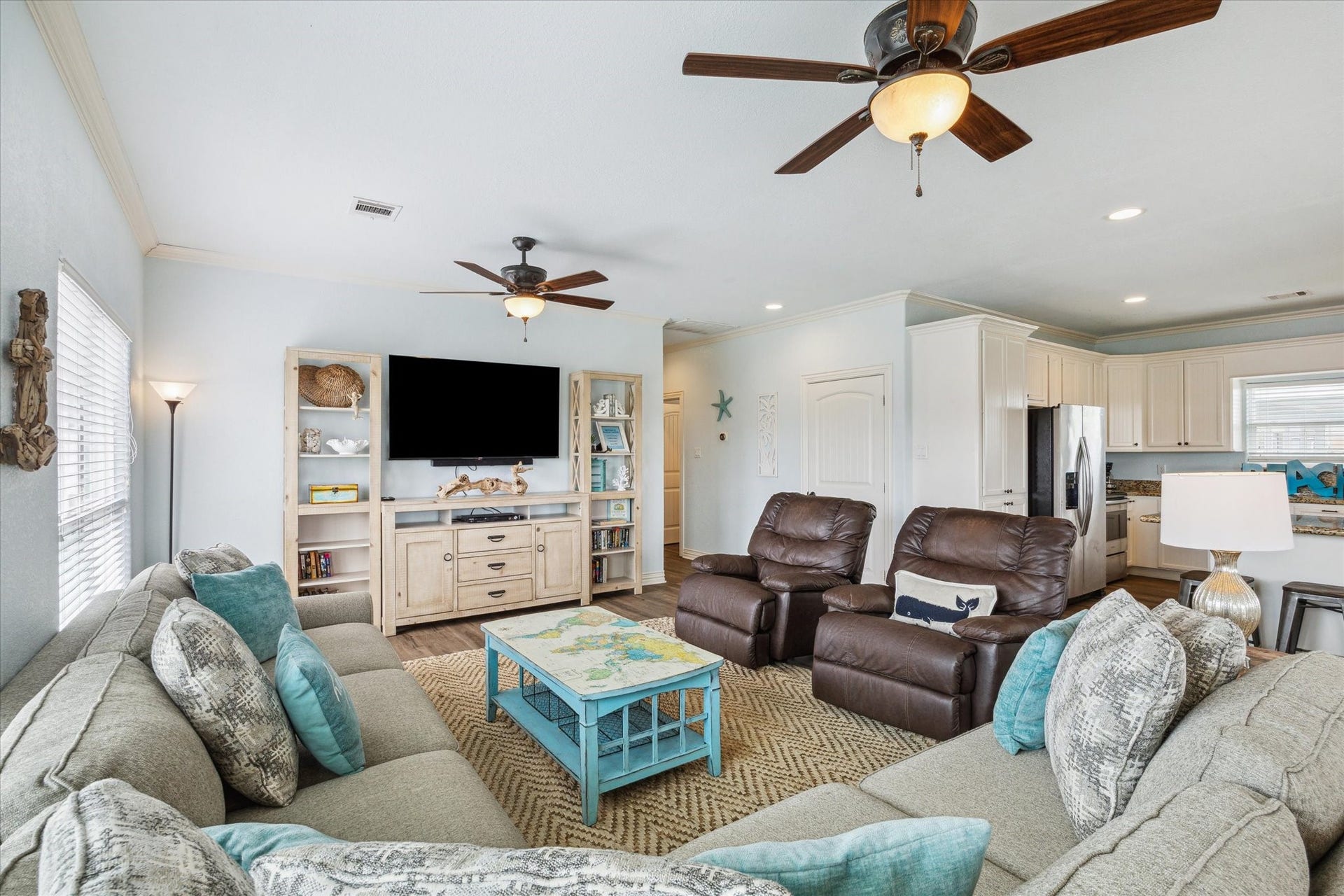 923 Tidelands Drive, Crystal Beach, TX 77650 The family room is conveniently located off the kitchen, creating an open and inviting space for easy conversation and relaxation while you cook or entertain.