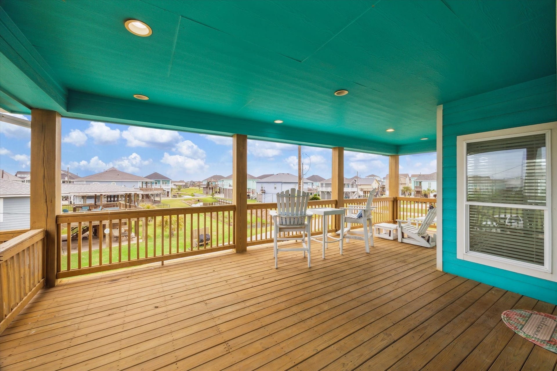 923 Tidelands Drive, Crystal Beach, TX 77650 A view of the entry landing leading to the expansive, covered balcony perfect for entertaining and taking in the gorgeous views.