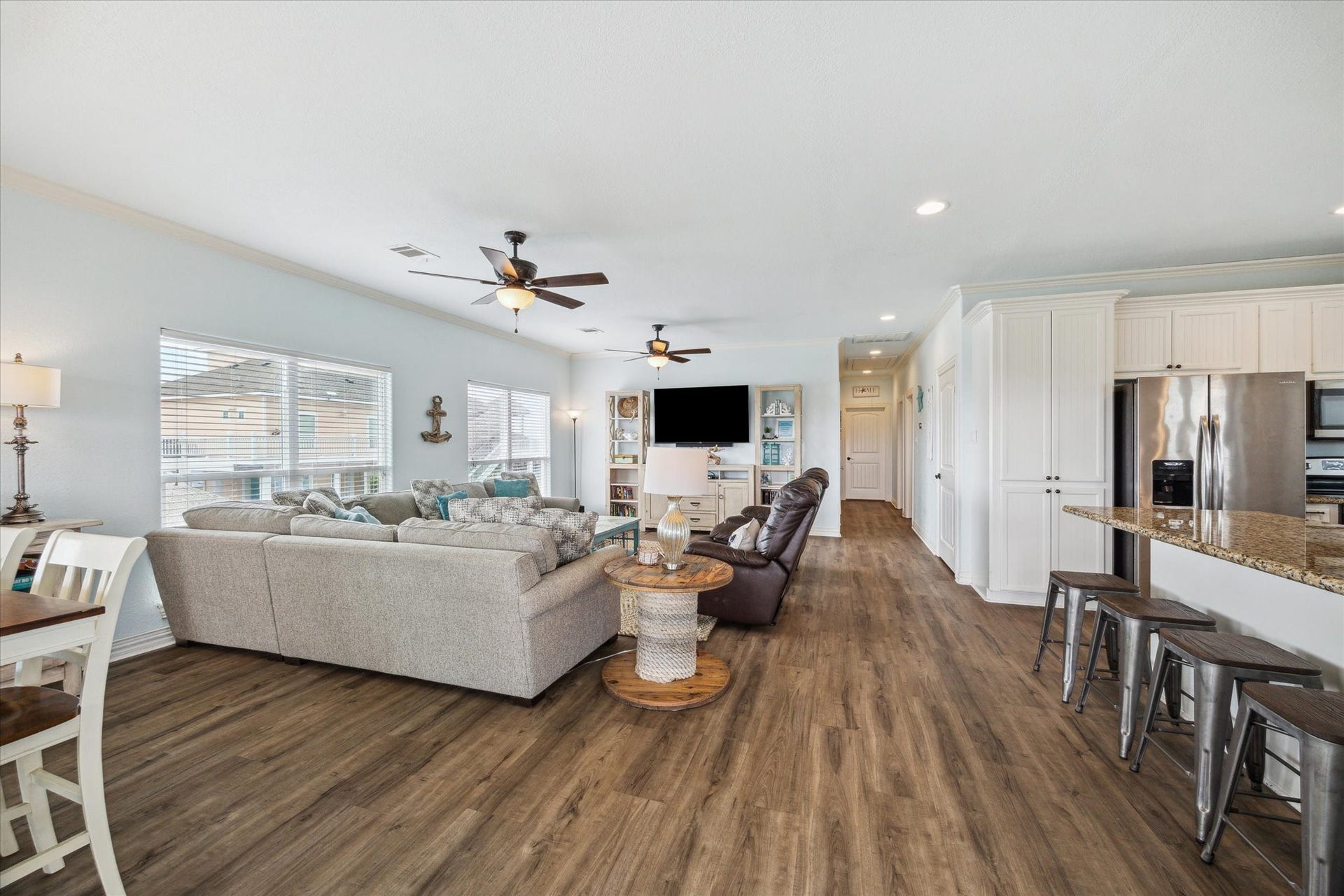 923 Tidelands Drive, Crystal Beach, TX 77650 Additional view of the family room, featuring the hall to the bedrooms, bathrooms and laundry space.
