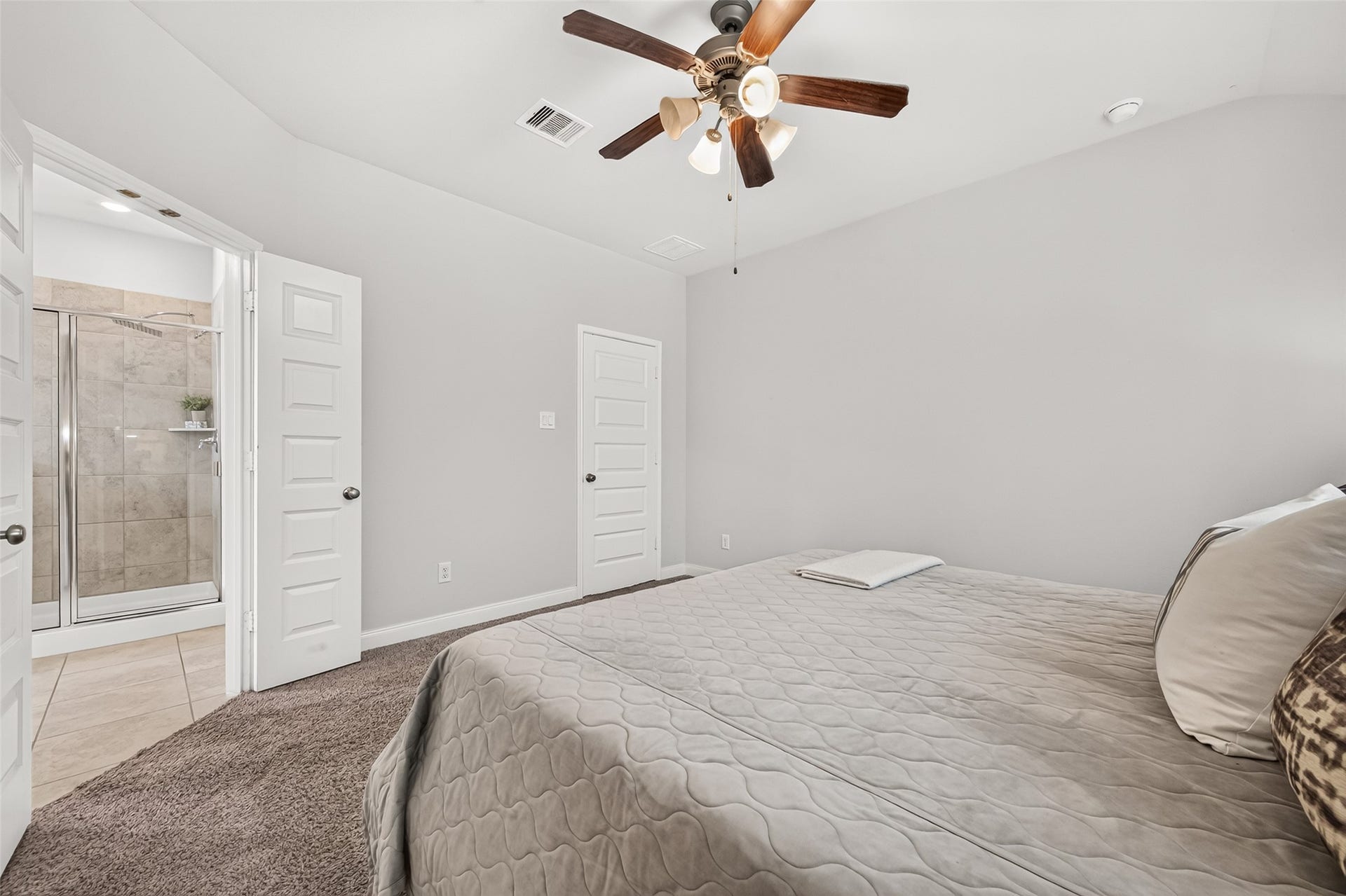 11223 Victoria Hollow Trace, Richmond, TX 77406 Primary suite features a private, spa-inspired ensuite bathroom