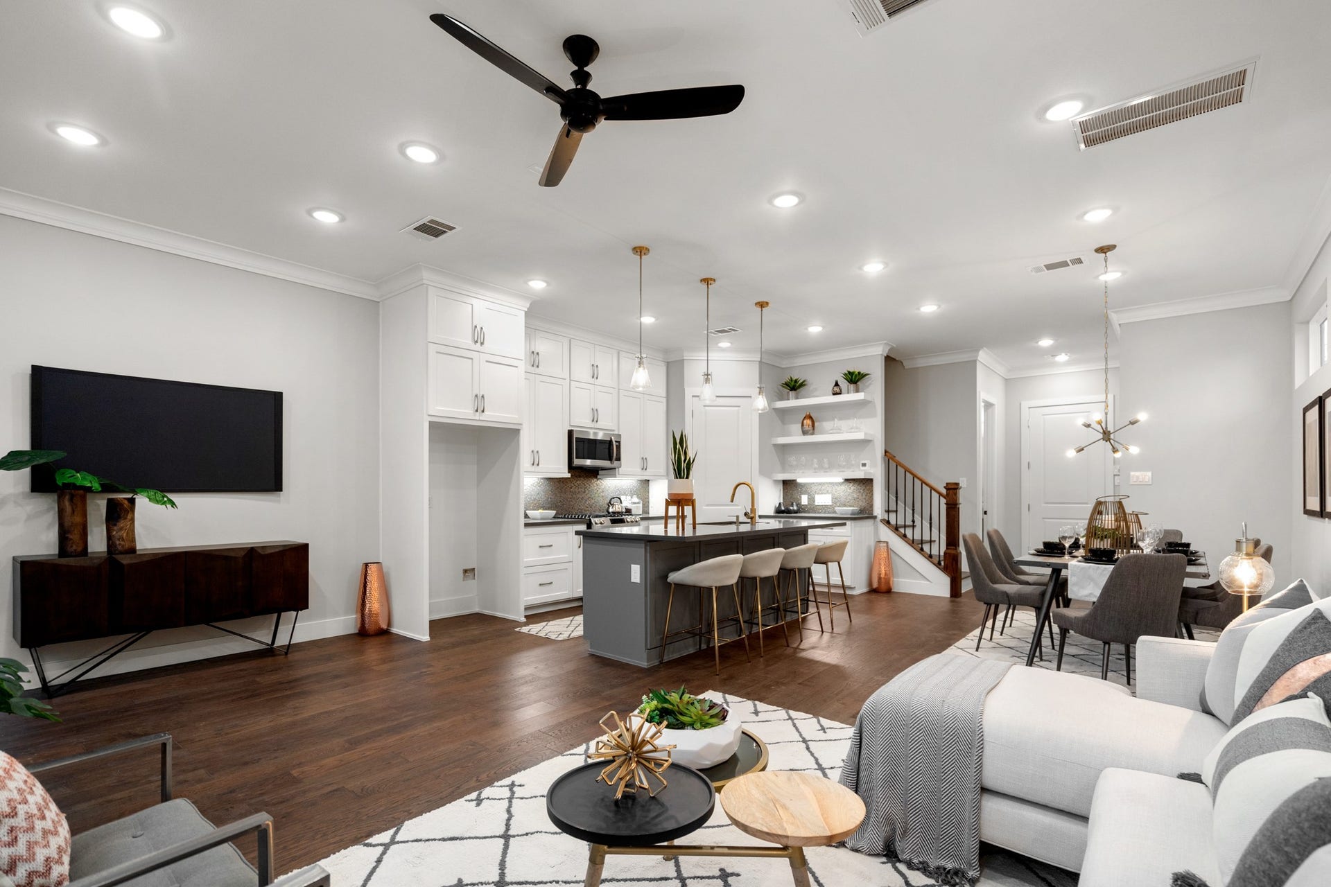 314 N Stiles Street, Houston, TX 77011 Whether you're curling up with a book or hosting a movie night with friends, this inviting space is perfect for relaxation and entertainment alike. Photos are of previous model home.