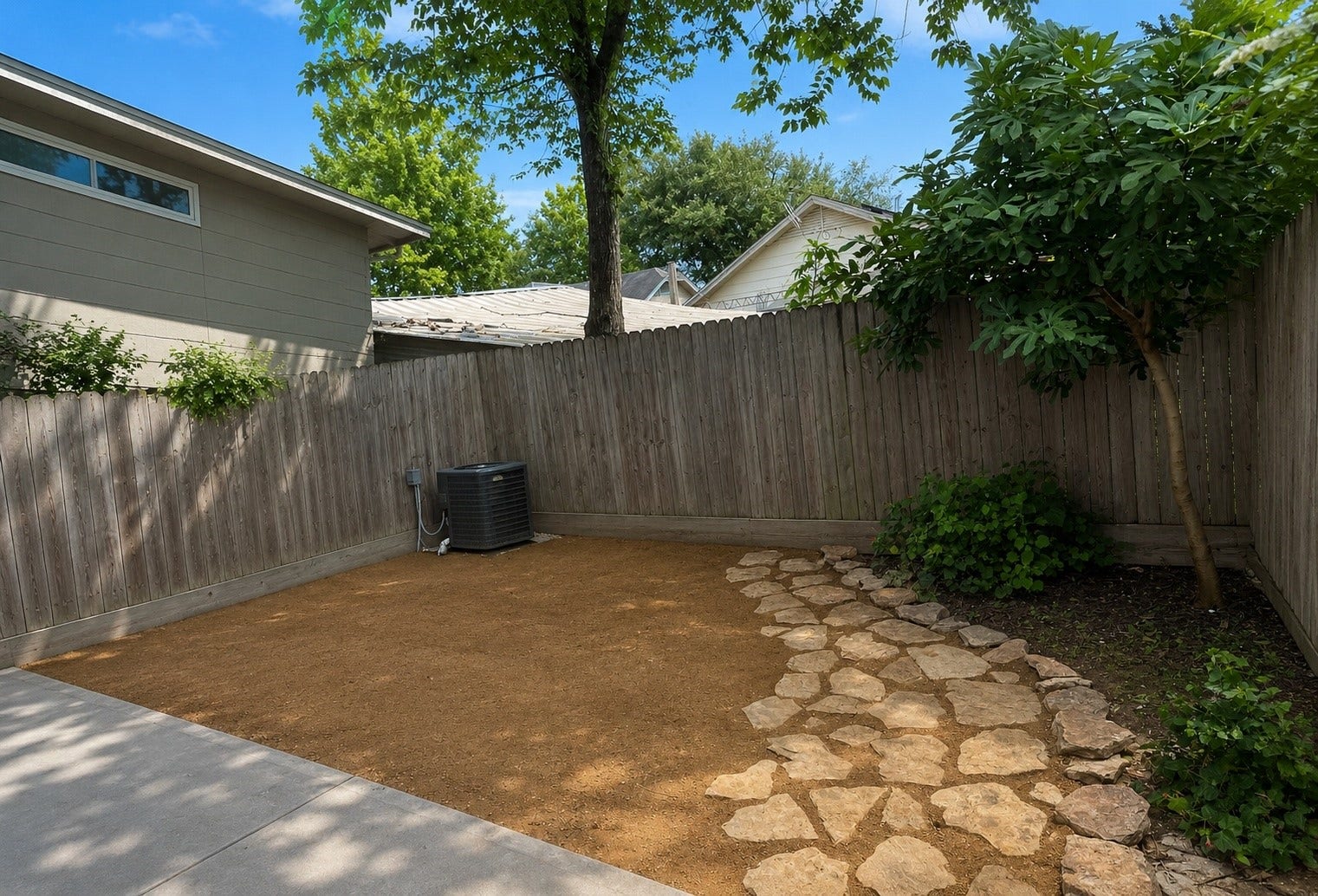 314 N Stiles Street, Houston, TX 77011 Outside, the generous backyard offers plenty of room for pets to roam and guests to gather.