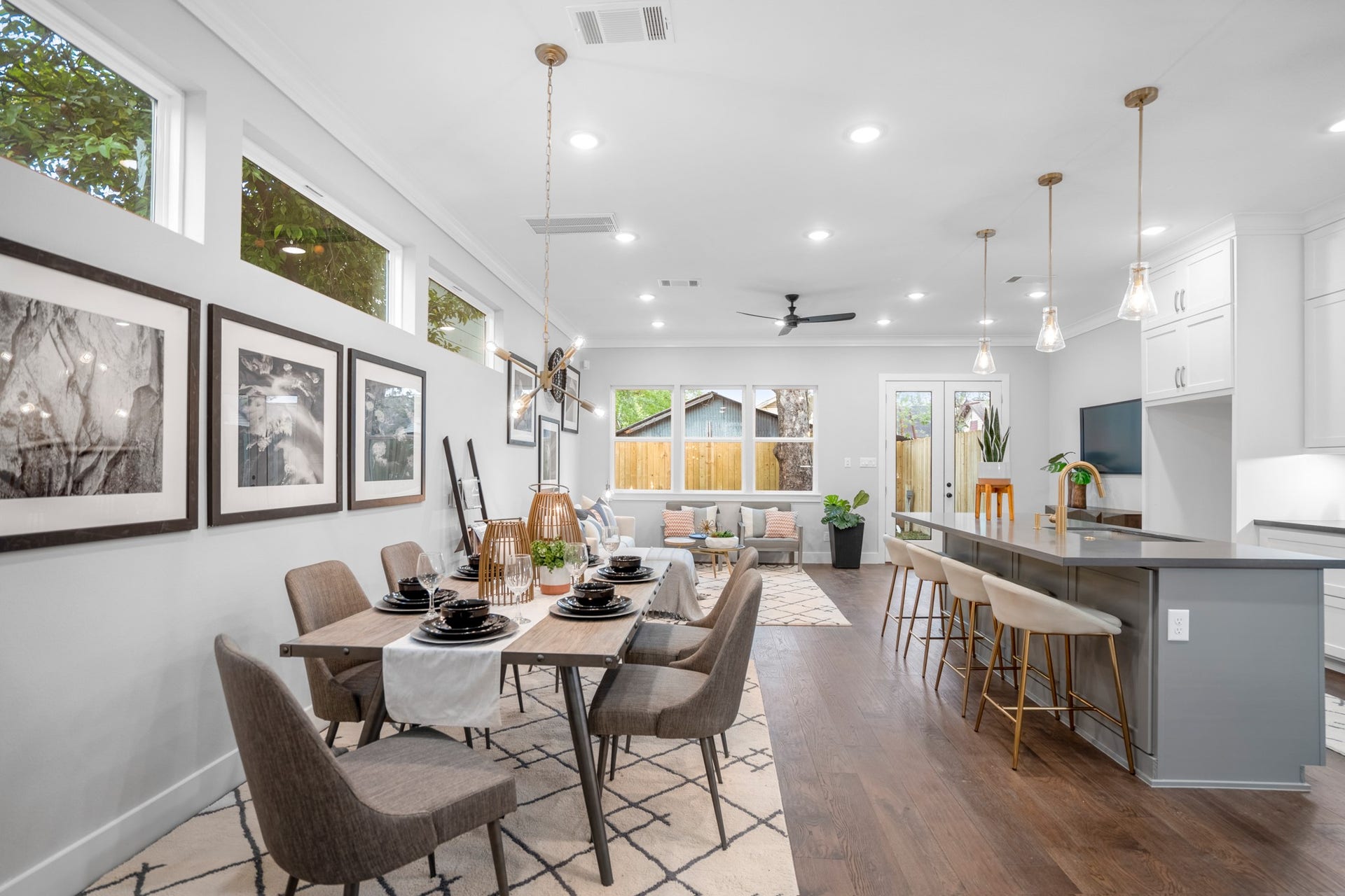 314 N Stiles Street, Houston, TX 77011 Step inside to discover a spacious open floor plan, seamlessly blending the traditional and the contemporary. Upgraded floor-to-ceiling cabinetry and modern fixtures adorn the interior, creating an inviting atmosphere. Photos are of previous model home.