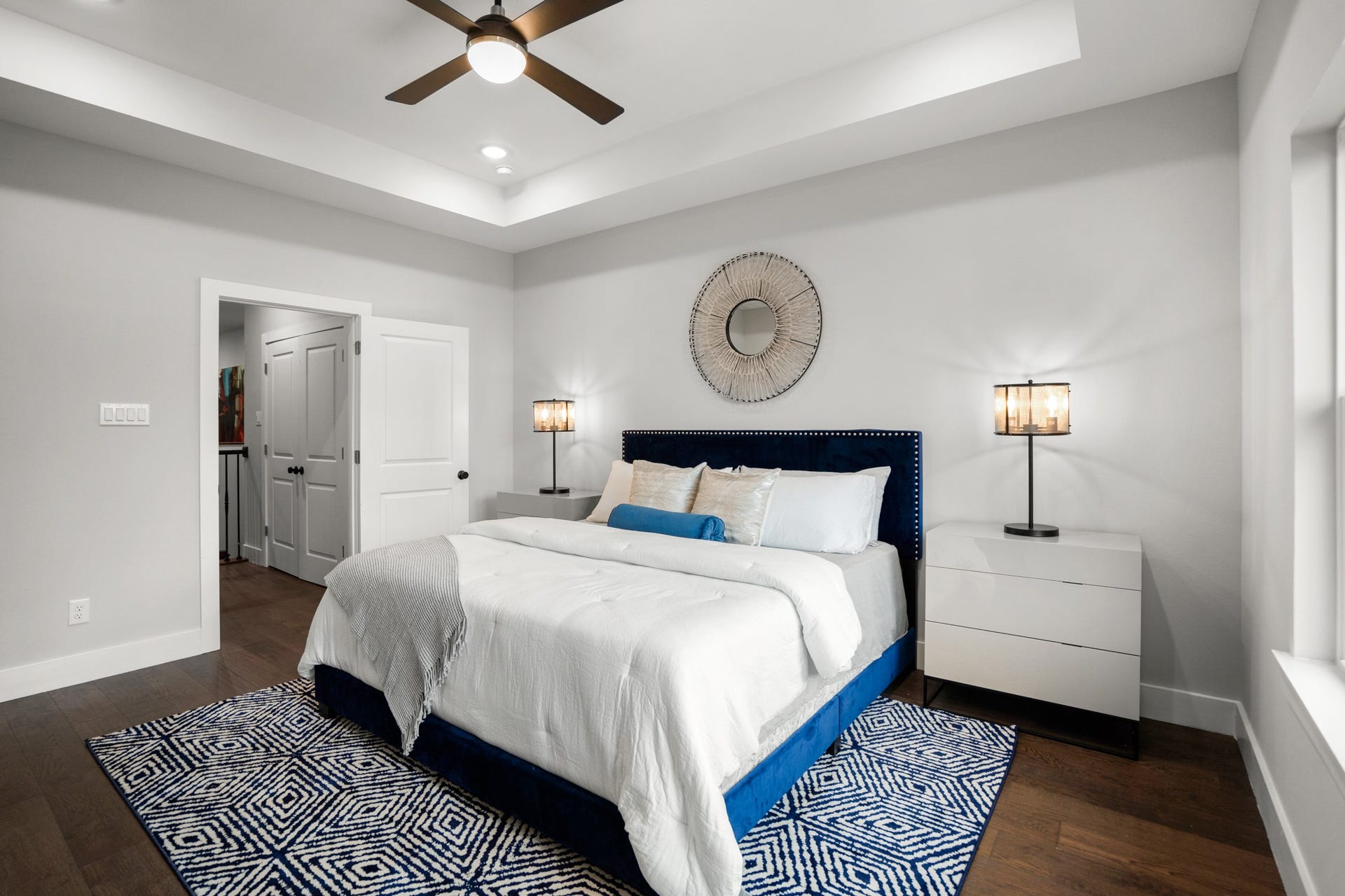 314 N Stiles Street, Houston, TX 77011 Upstairs, the master bedroom awaits, featuring an accent tray ceiling that adds a touch of luxury. Photos are of previous model home.
