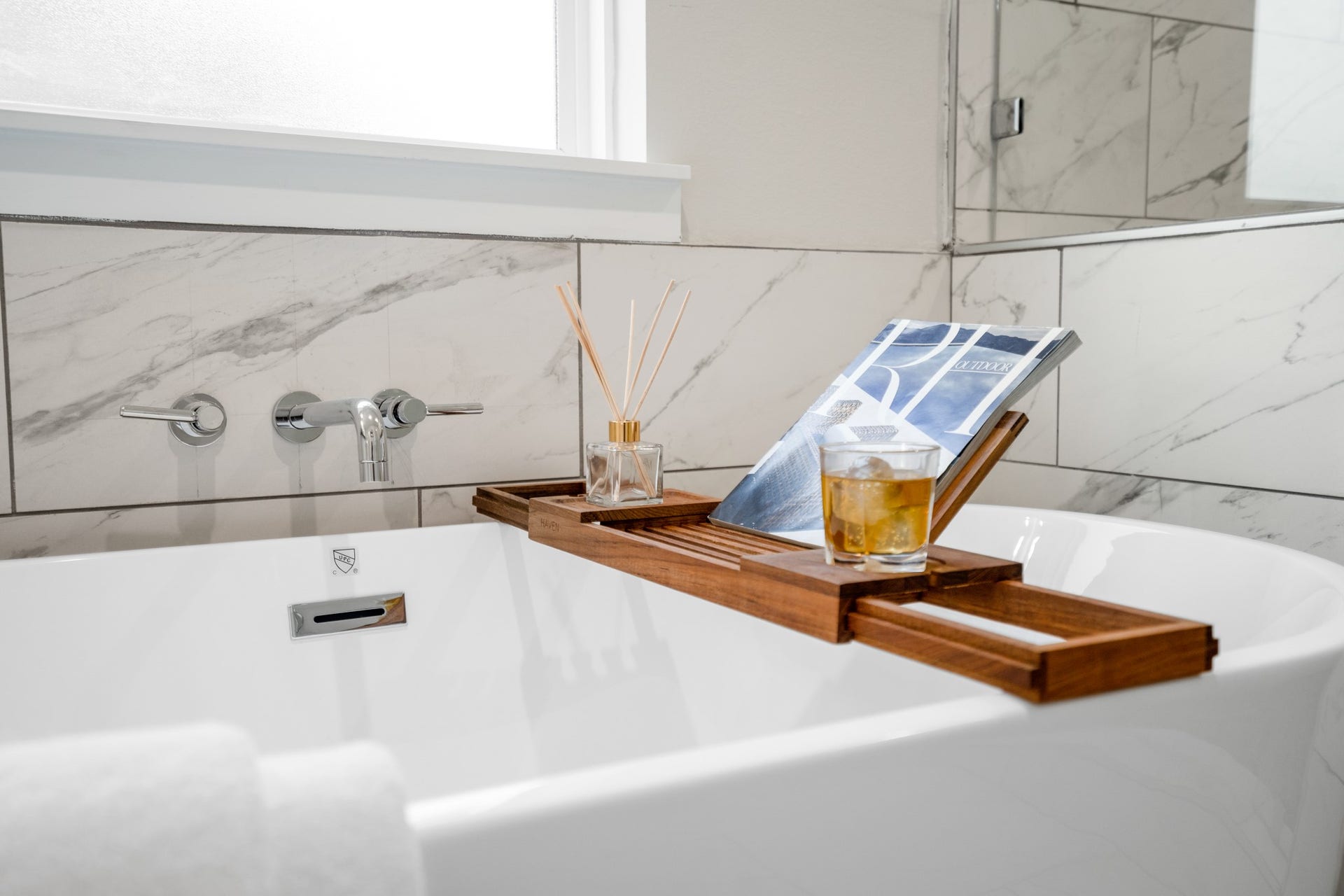314 N Stiles Street, Houston, TX 77011 The bath tub is a symbol of luxury and relaxation, inviting you to unwind and indulge in a blissful soak after a long day. Photos are of previous model home.
