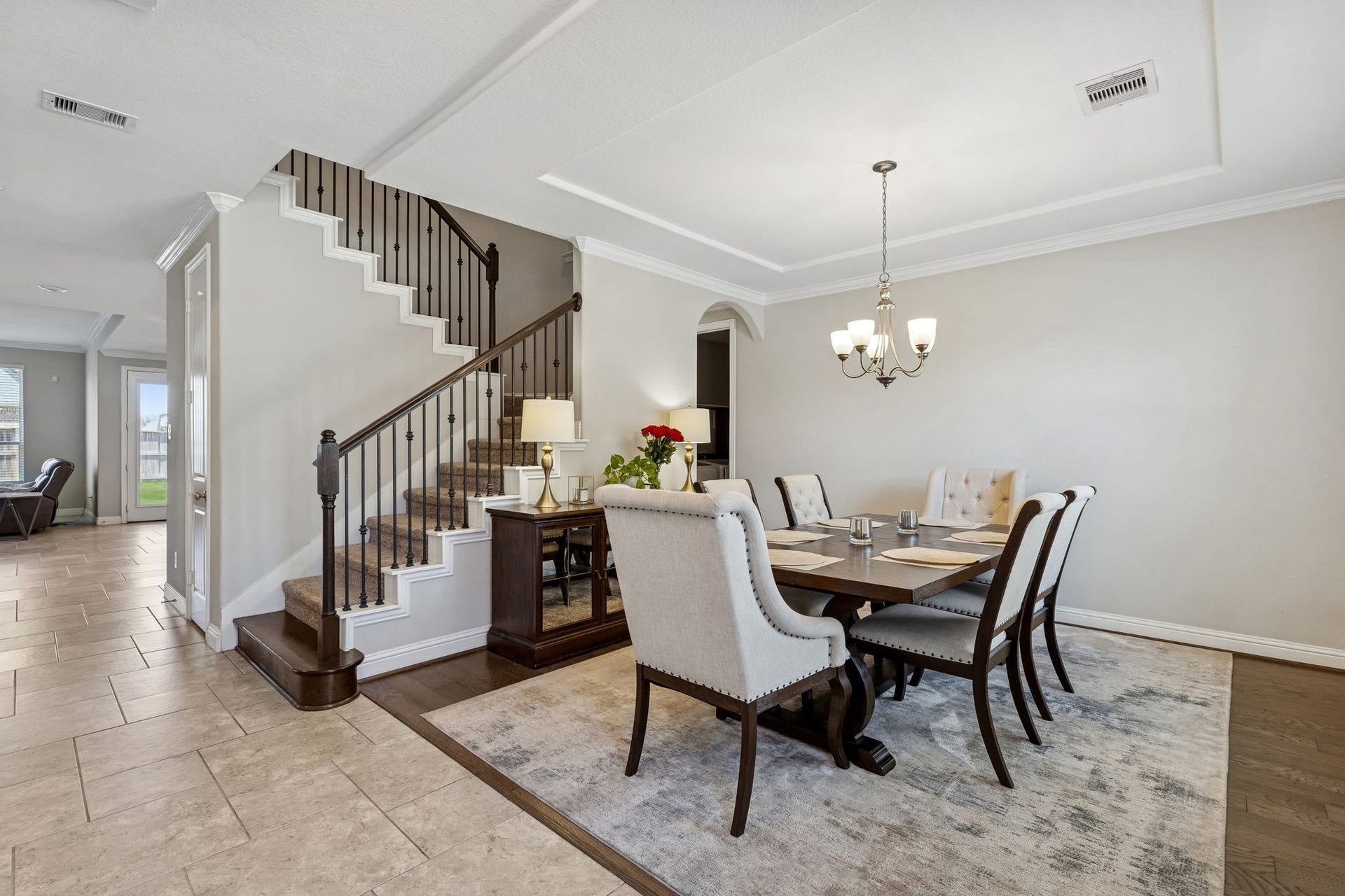 1619 Dove Ridge Drive, Katy, TX 77493 Host elegant dinners in this formal dining area featuring crown molding and engineered wood flooring. The space is perfectly positioned off the entry, offering a sophisticated first impression for your guests.
