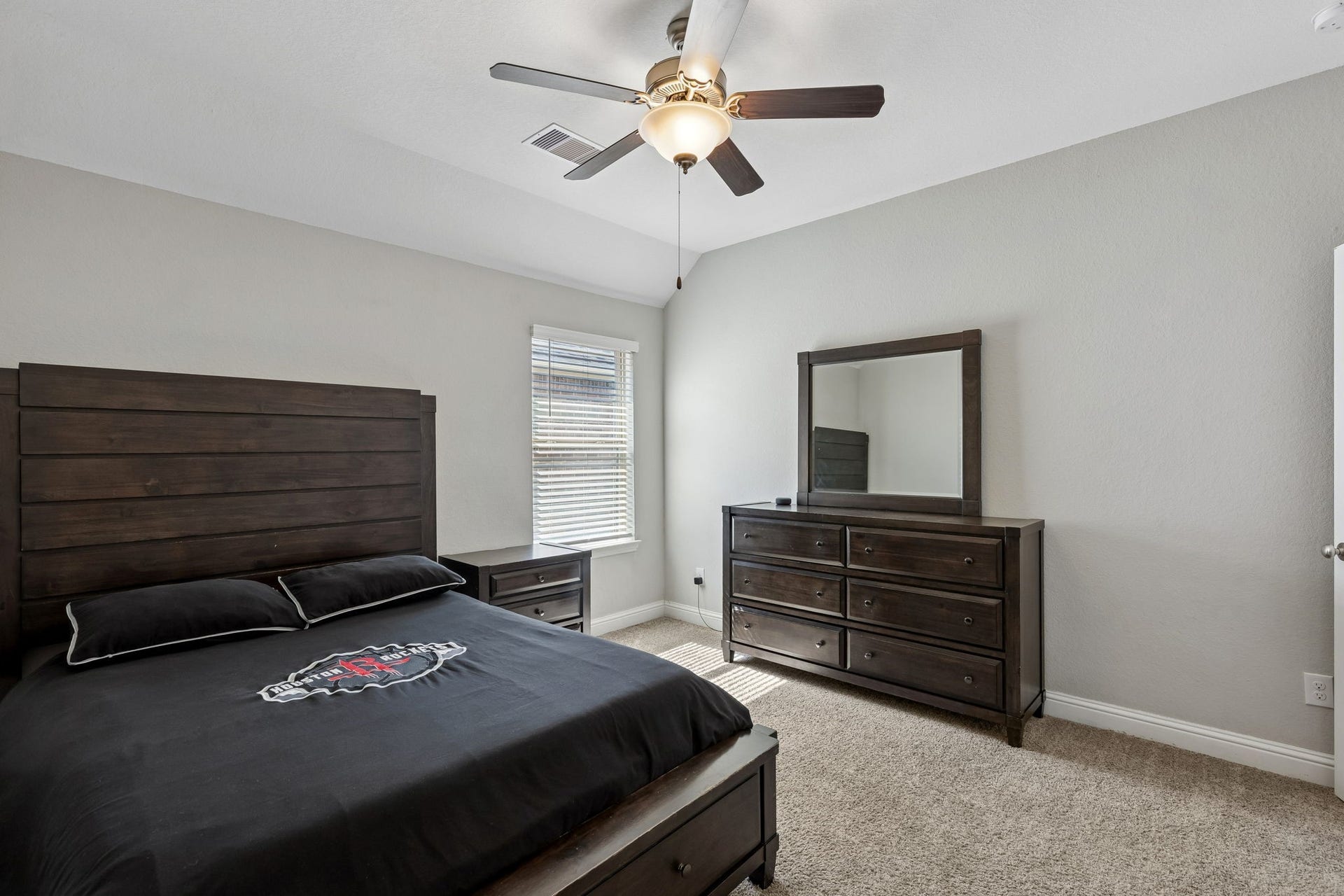 1619 Dove Ridge Drive, Katy, TX 77493 The fourth bedroom offers a generous and inviting room that is perfect if you're looking for comfort and versatility.