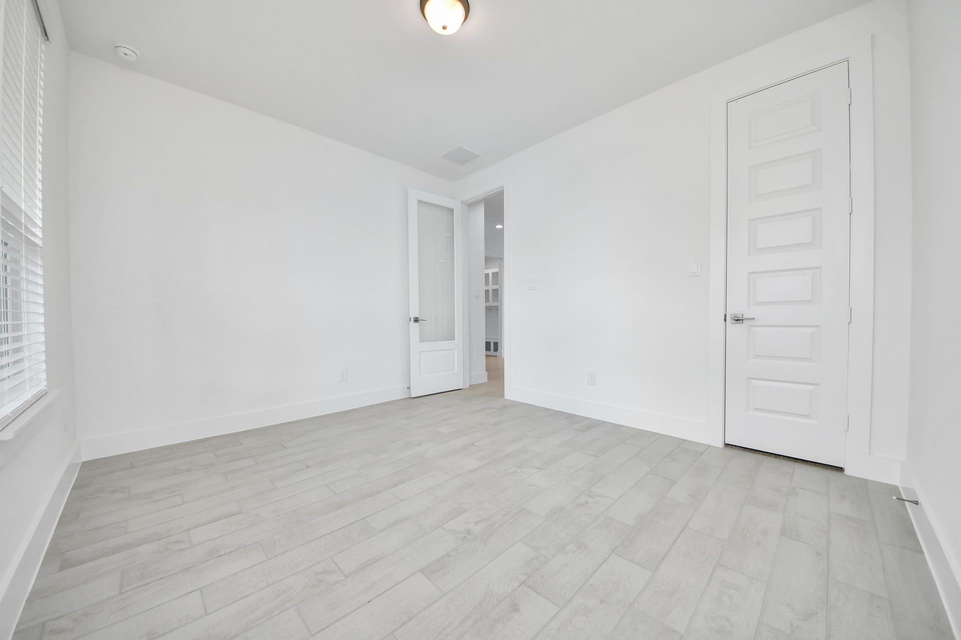 5906 Fox Peak Lane, Richmond, TX 77469 Generously sized secondary bedrooms featuring spacious closets, soft and inviting carpeting underfoot, large windows allowing plenty of natural light, and the added touch of privacy blinds for your personal retreat. Sample photo of completed home with similar floor plan. Actual colors and selections may vary.