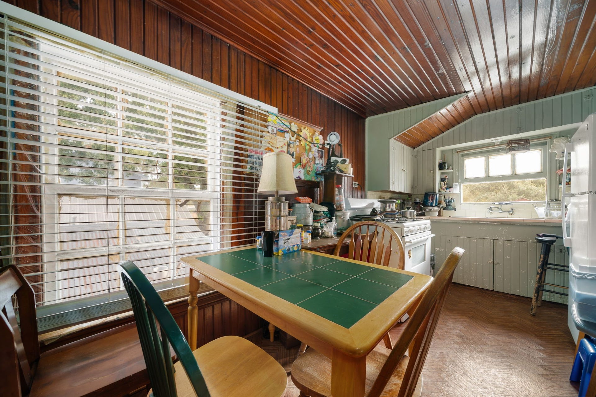 1821 Hatwell Street, Houston, TX 77023 Natural wood paneling makes for a great cottage appeal.
