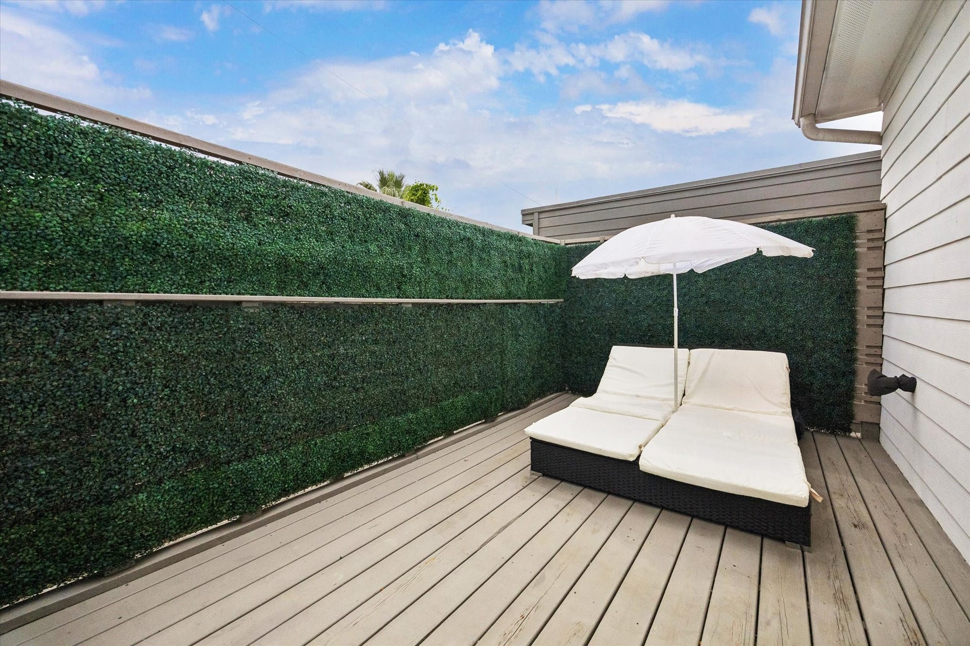 1959 Portsmouth Street, Houston, TX 77098 This private terrace is located off the primary bathroom. Greenery thoughtfully added by the current owners for added privacy.