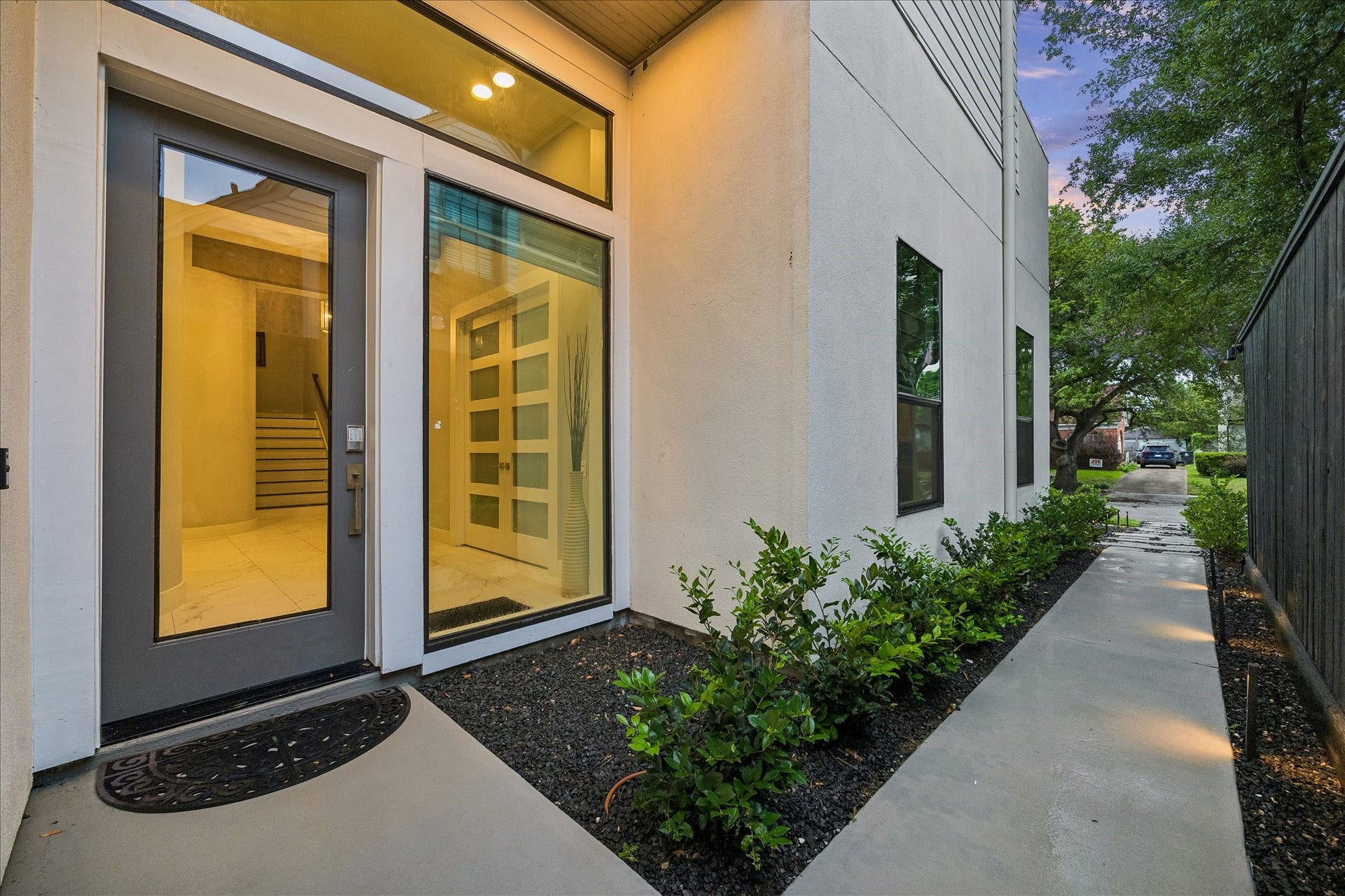 1959 Portsmouth Street, Houston, TX 77098 Lush landscaping lines the walkway leading to the front entry.