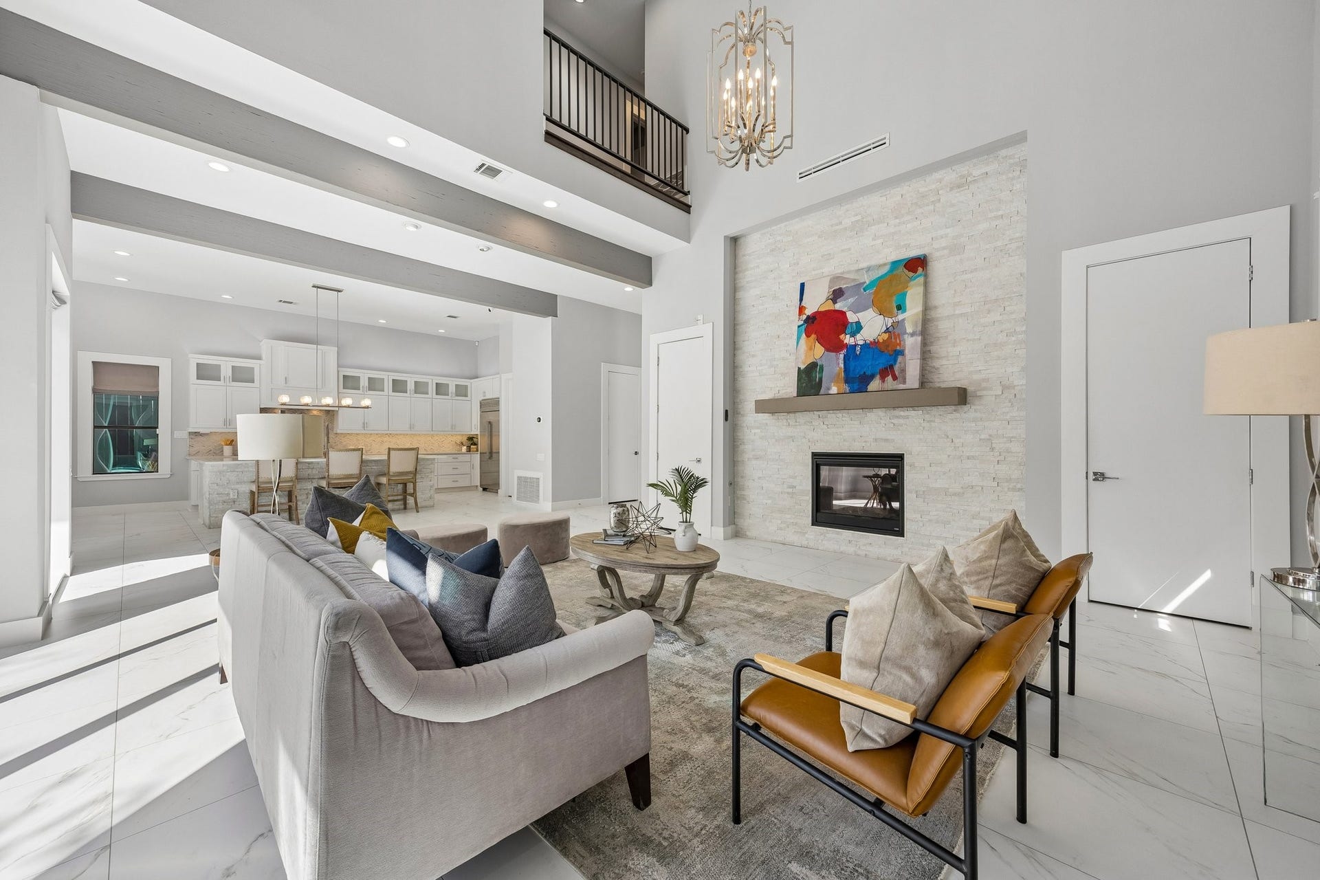1959 Portsmouth Street, Houston, TX 77098 Stone accent wall with mantle and fireplace are the focal point of the living room.