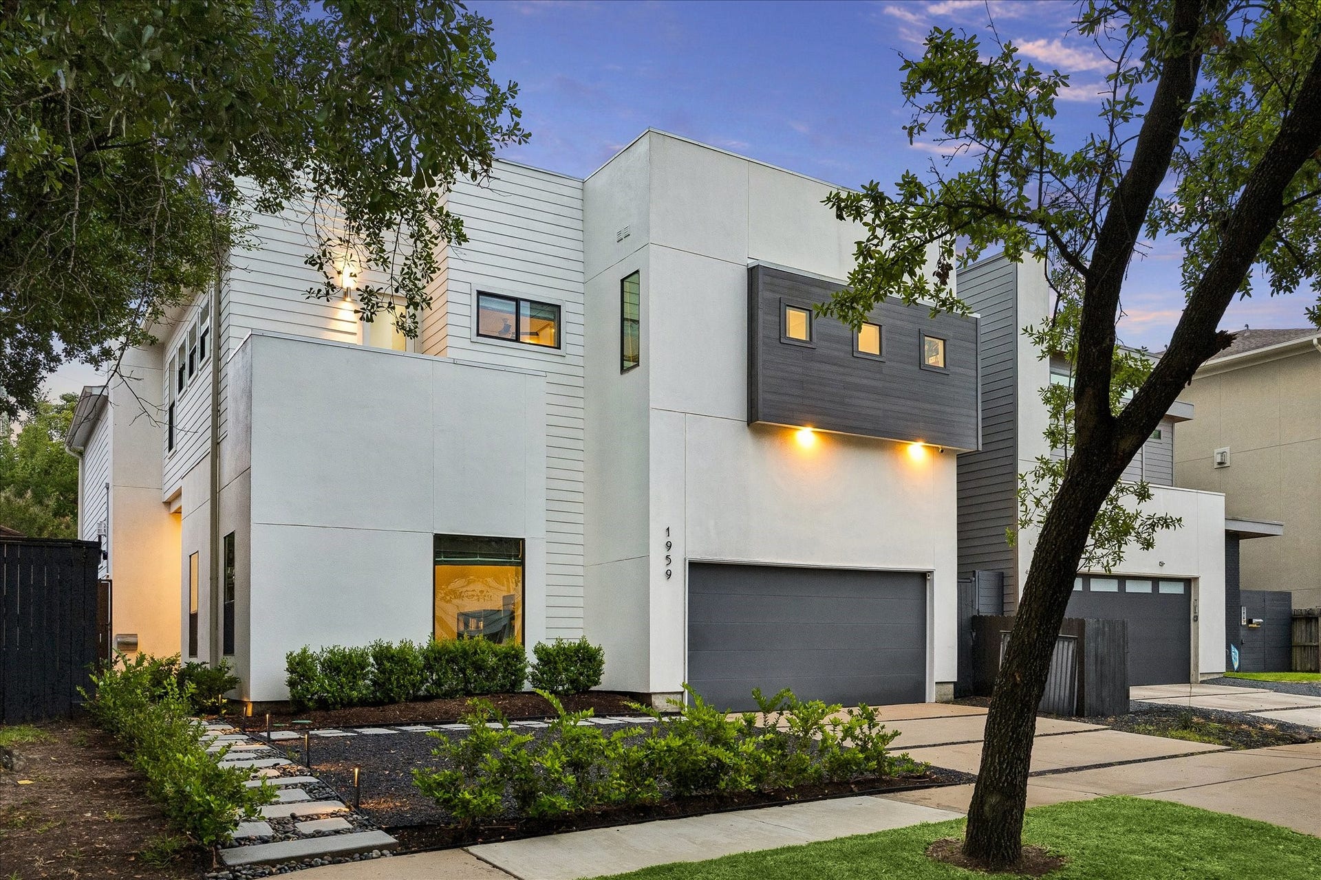 1959 Portsmouth Street, Houston, TX 77098 Tasteful landscaping with additional parking in the front of this home.