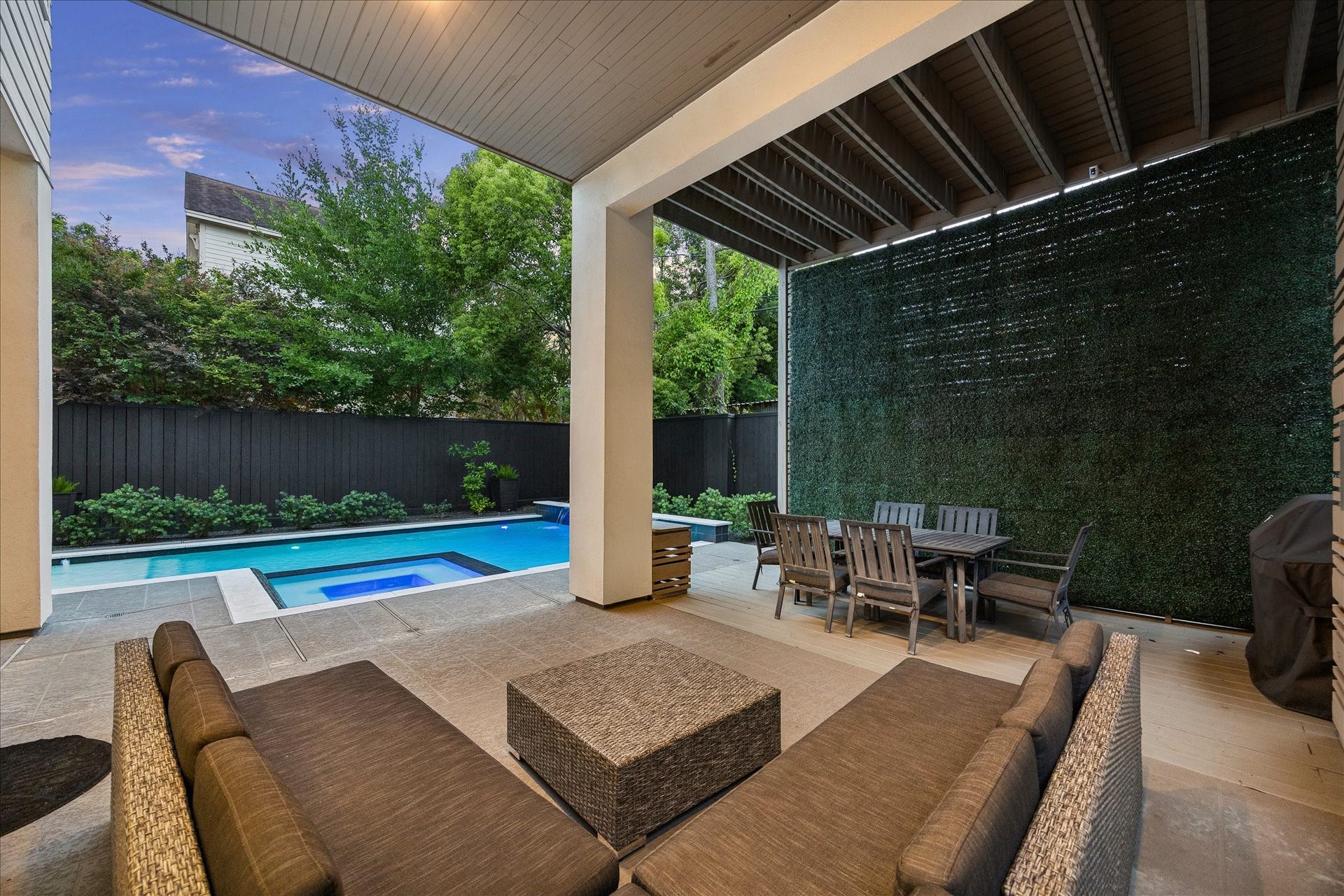 1959 Portsmouth Street, Houston, TX 77098 Stepping onto the outdoor patio from the dining room, you enter this covered area with seating and outdoor dining space.