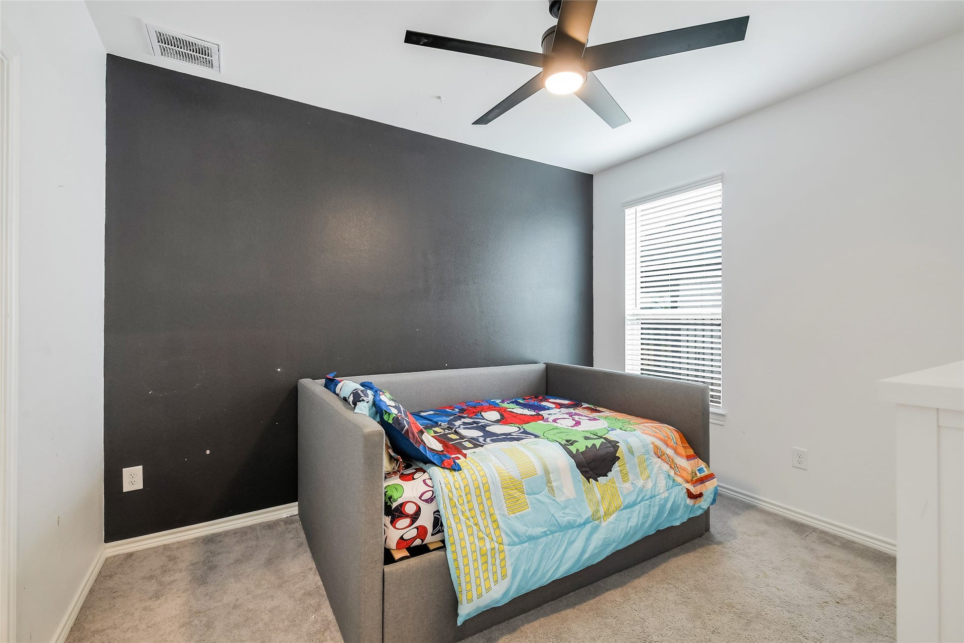 Another generously sized secondary bedroom gives everyone room to spread outideal for family, overnight guests, a creative space, or a private study while maintaining separation from the home's main gathering areas.
