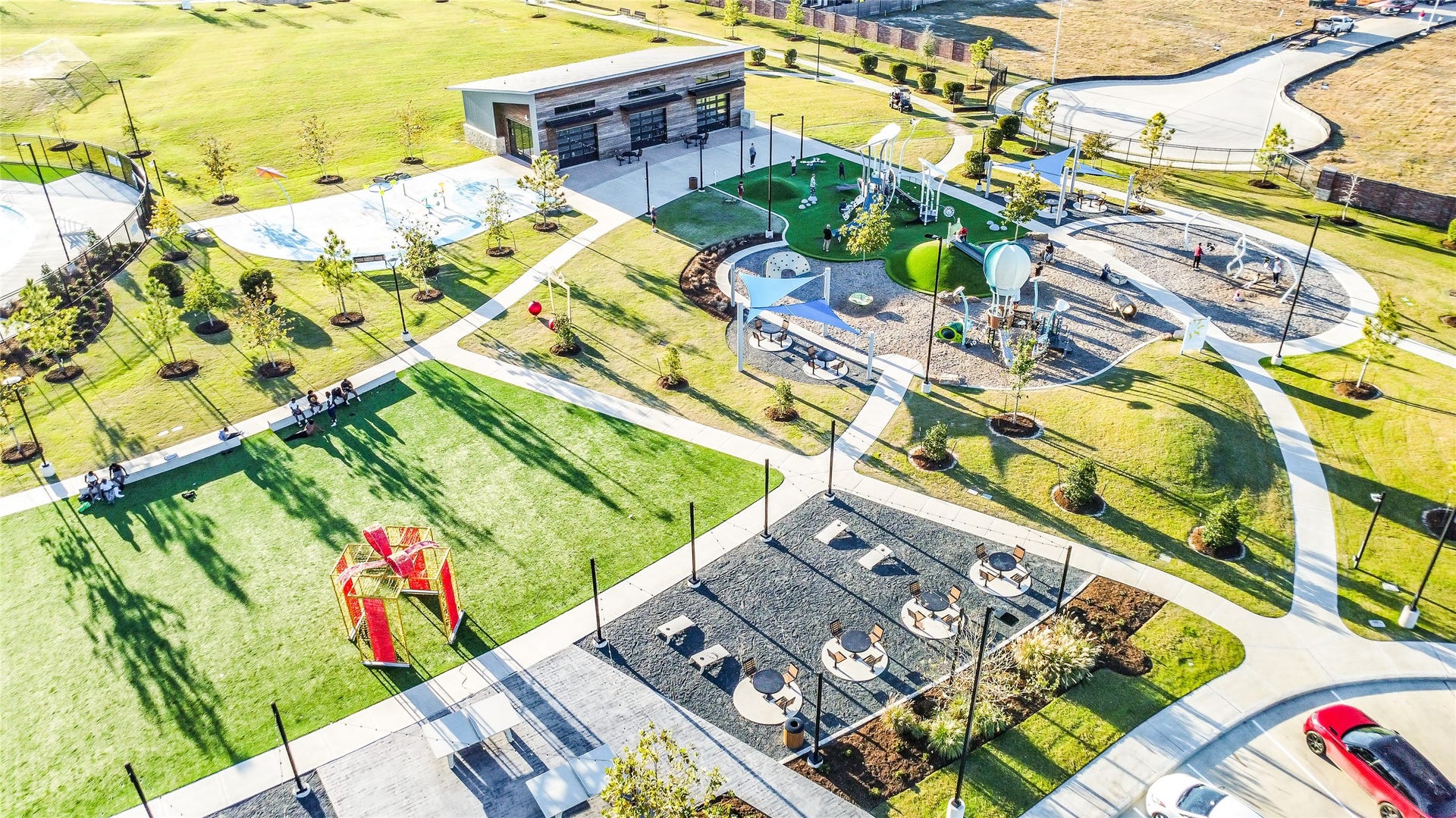 A final aerial angle highlights
convenient parking, landscaped
grounds, and easy access to the
community amenities.
