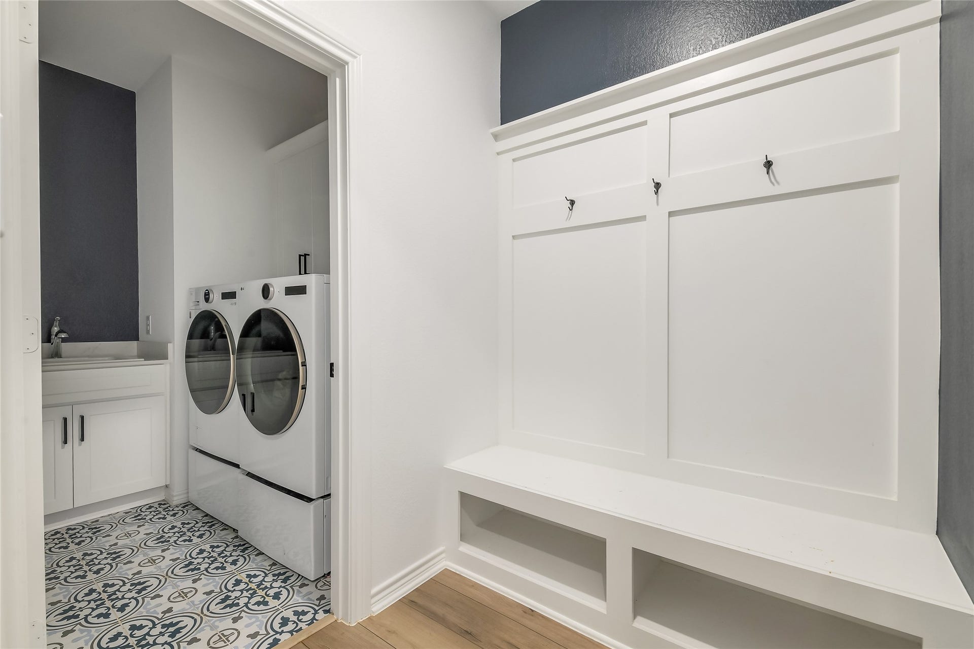 Thoughtfully designed everyday living with a dedicated drop zone and nearby laundrygiving busy households a convenient place to organize bags, shoes, and daily essentials while keeping clutter out of the main living spaces.