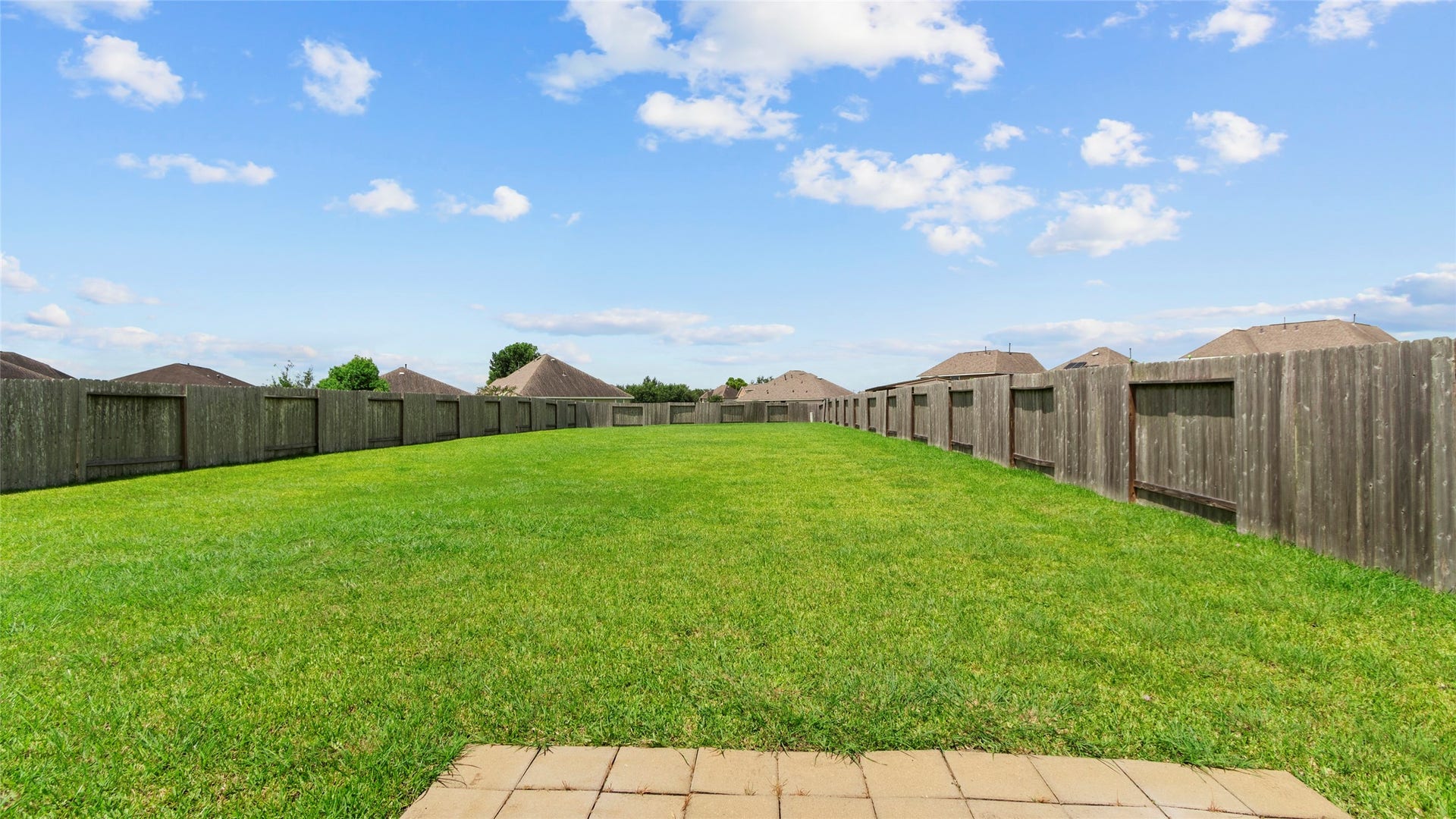 1503 Barras Street, Alvin, TX 77511 As you step outside, the oversized backyard opens up with plenty of room for pets, play, gardening, entertaining, and more.