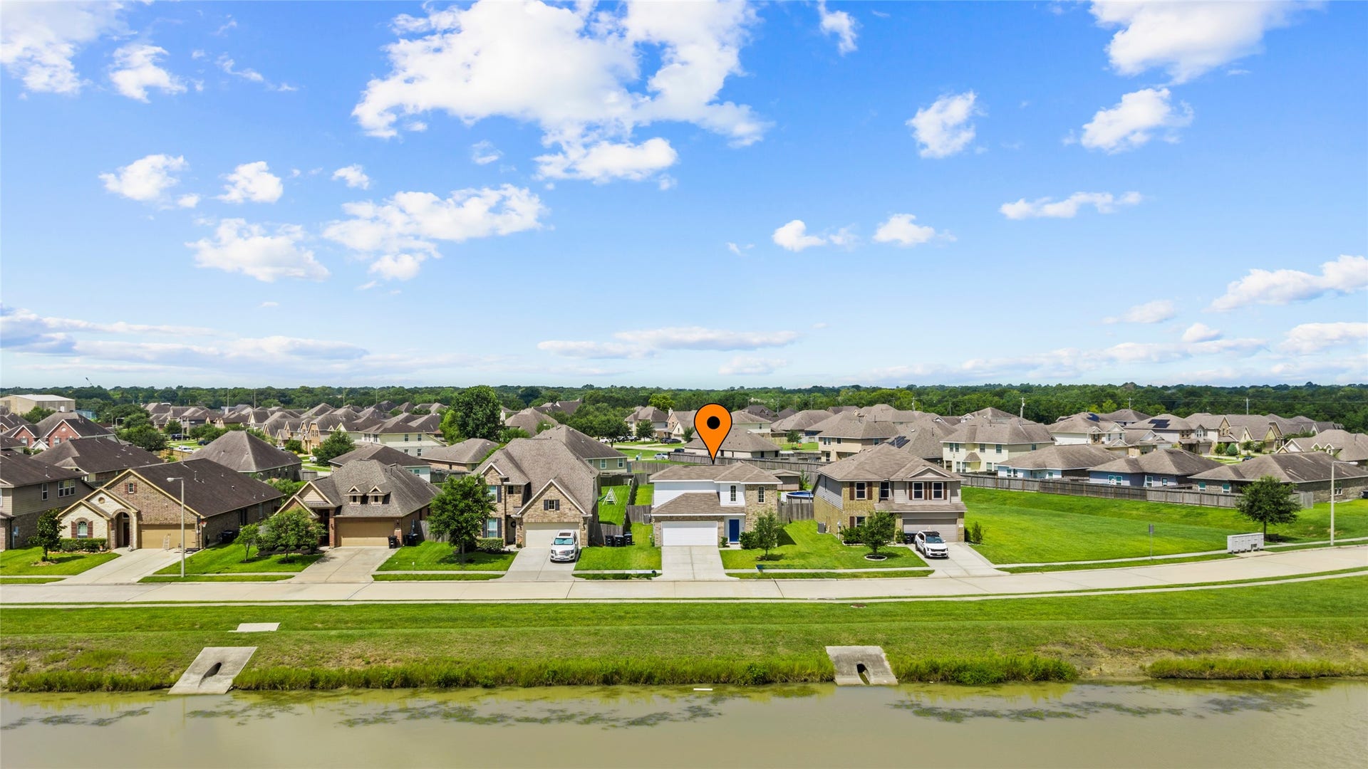 1503 Barras Street, Alvin, TX 77511 No front neighbors! Across the street, you have a stocked retention pond.