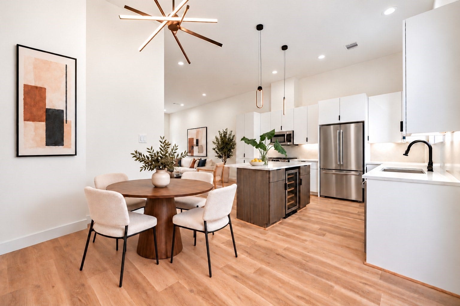 Bright dining area beside the island kitchen, with direct access to the private balcony. *Furniture, refrigerator and wine cooler virtually added.