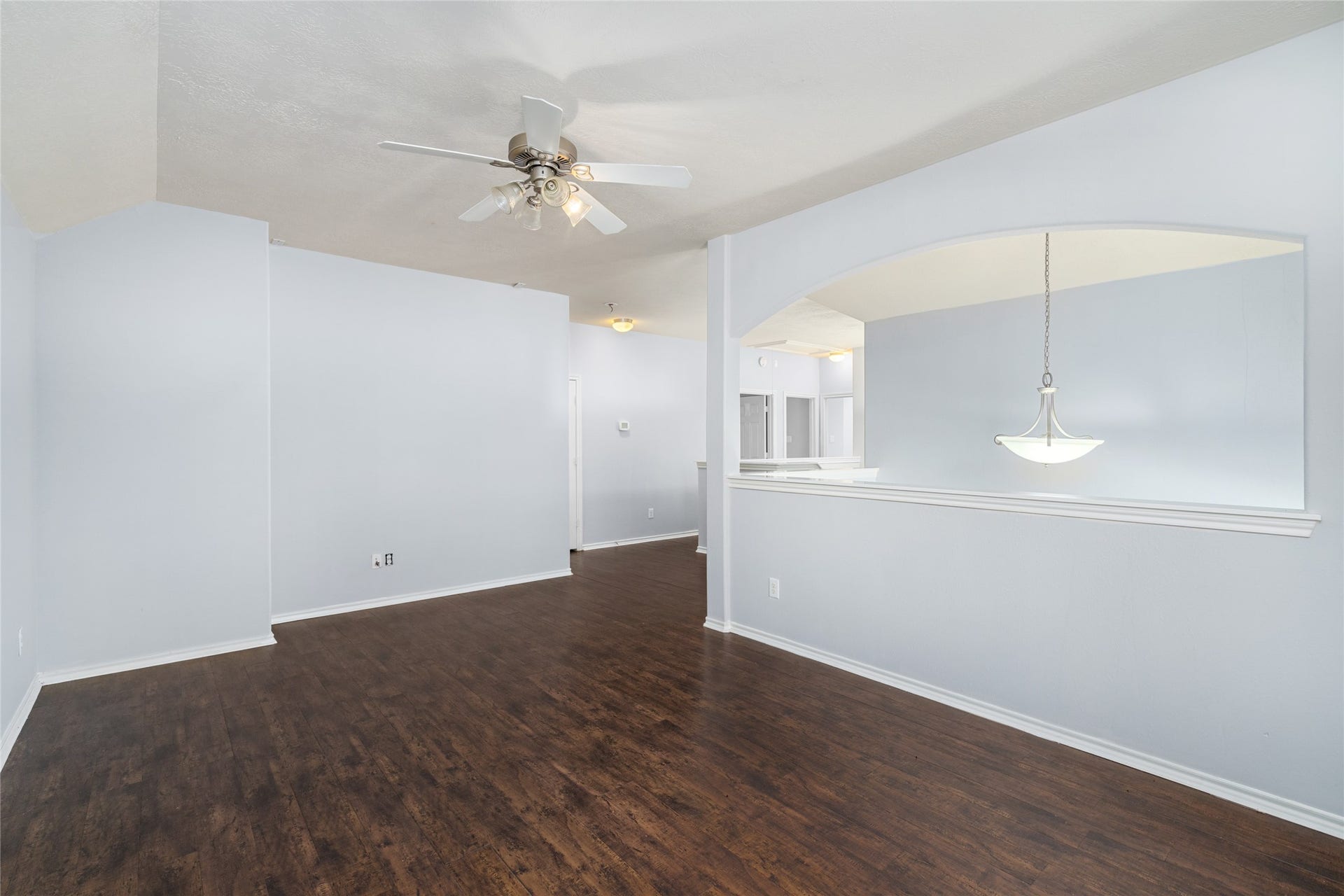24519 Evangeline Springs Lane, Katy, TX 77494 Alternate view of the game room showing its open floor area and connection to the adjacent upper-level spaces. The room's flexible footprint allows buyers to adapt it to changing needs, from play space to entertainment or study area.