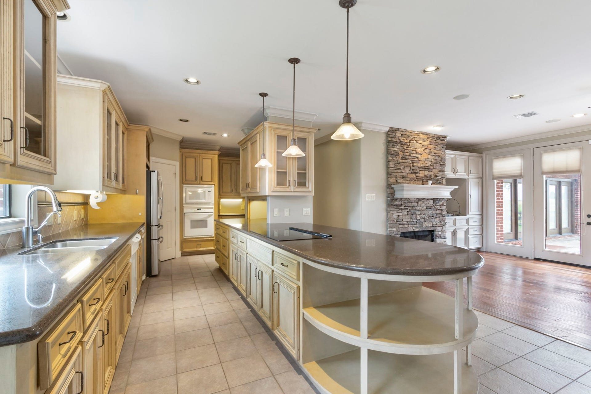 7806 Spirit Hollow Court, Missouri City, TX 77459 Another view of the kitchen highlighting all the cabinets.