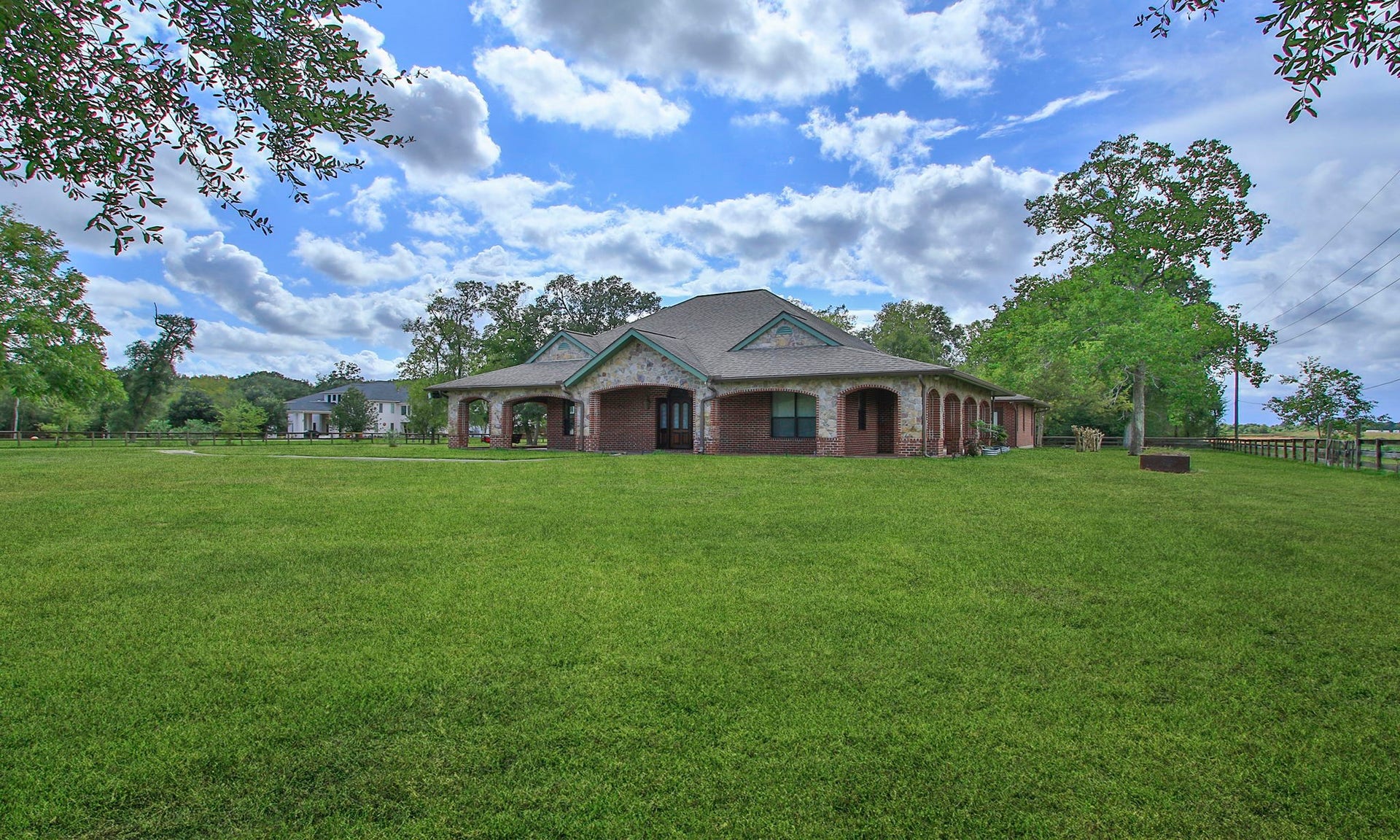 7806 Spirit Hollow Court, Missouri City, TX 77459 View showing the covered porch on 3 sides of the home.