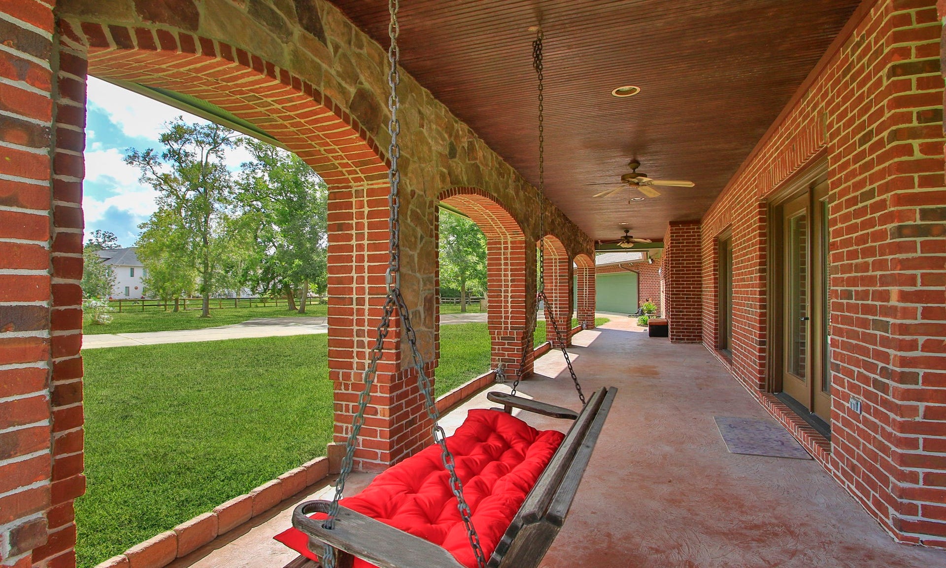 7806 Spirit Hollow Court, Missouri City, TX 77459 A great porch to enjoy the outside.
