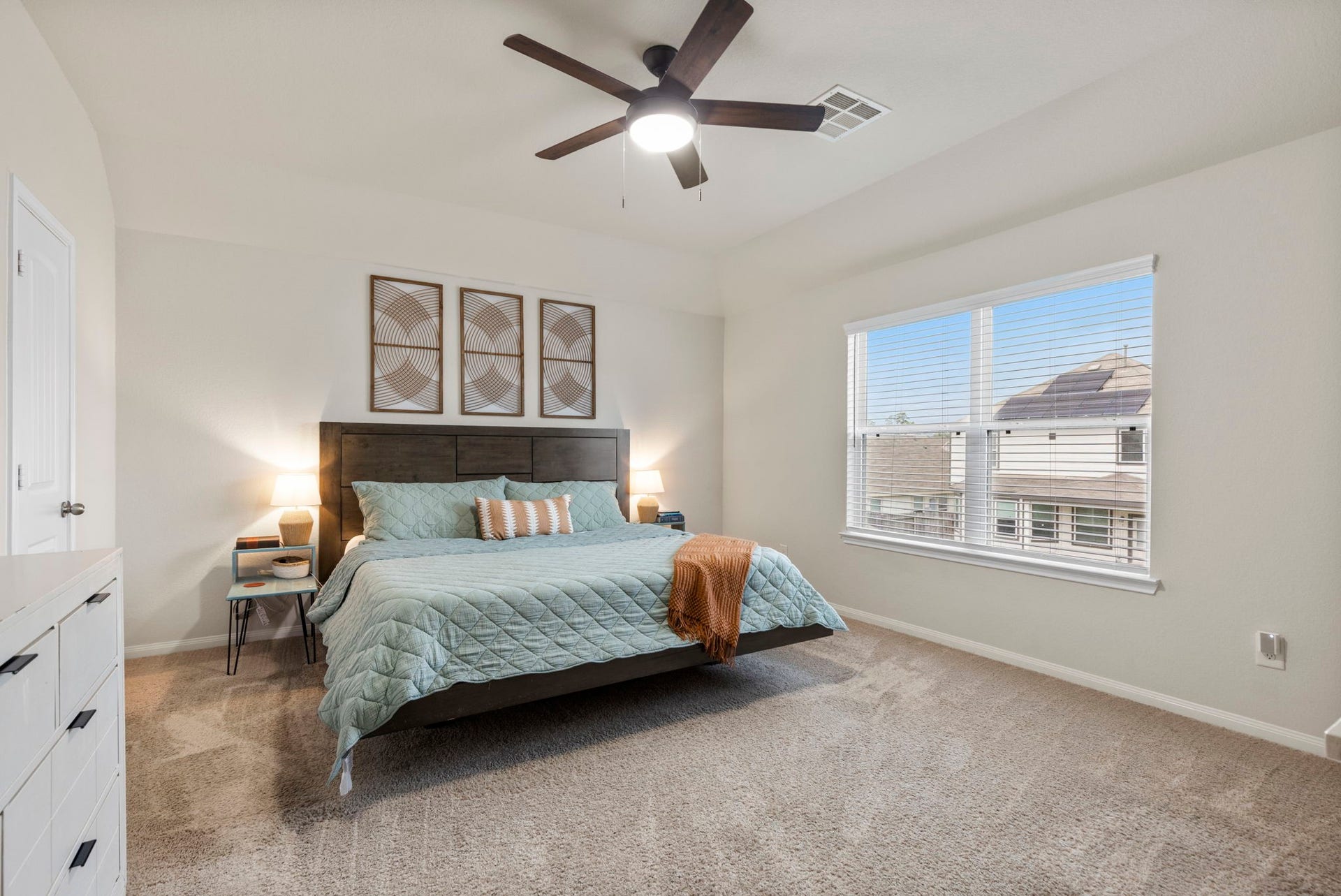 The spacious primary bedroom provides a comfortable retreat with plenty of room to unwind!