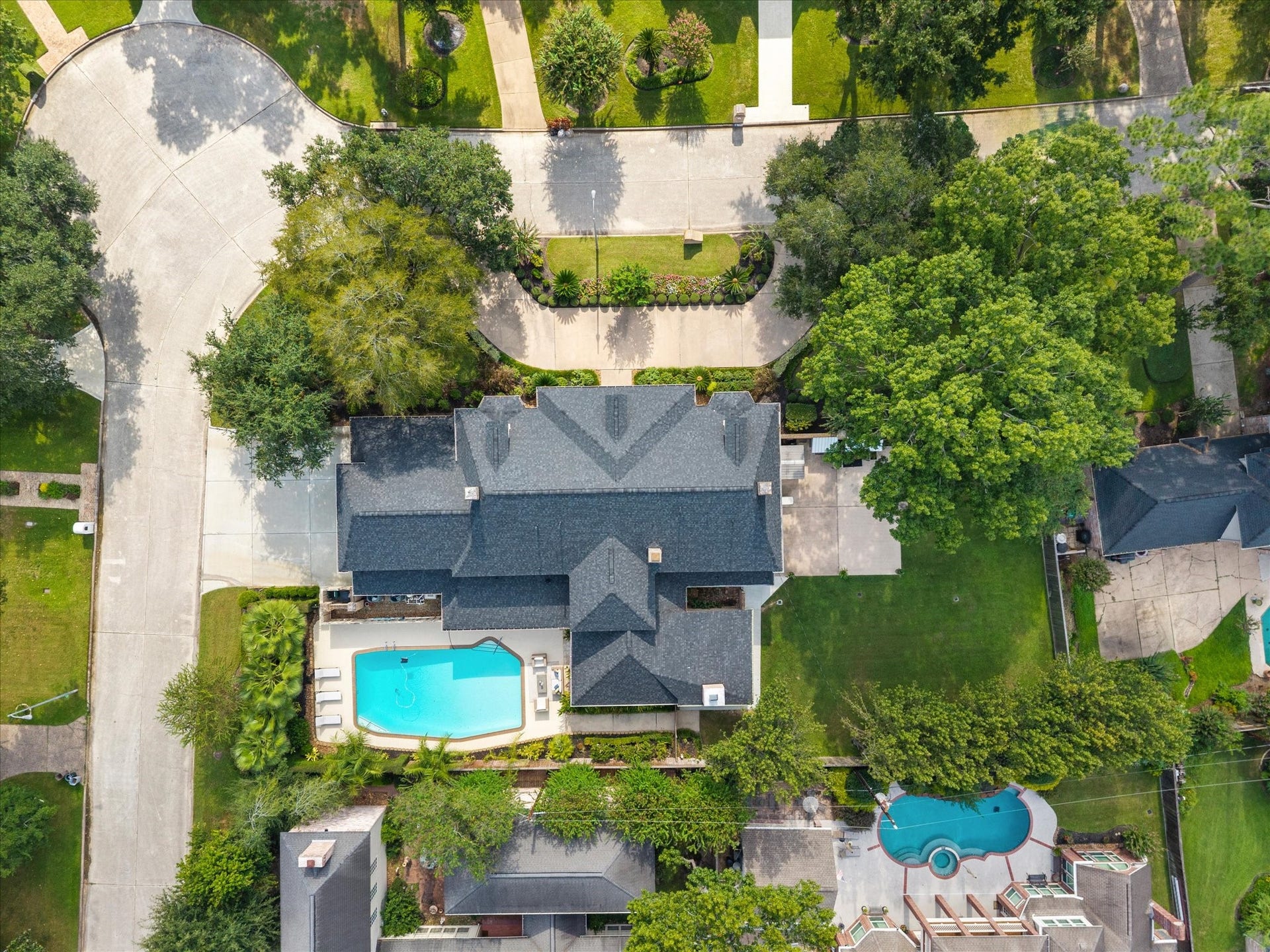 15902 Cumbria Drive, Spring, TX 77379 Top down view of the house, the pool, and the two lots that make up the half acre.